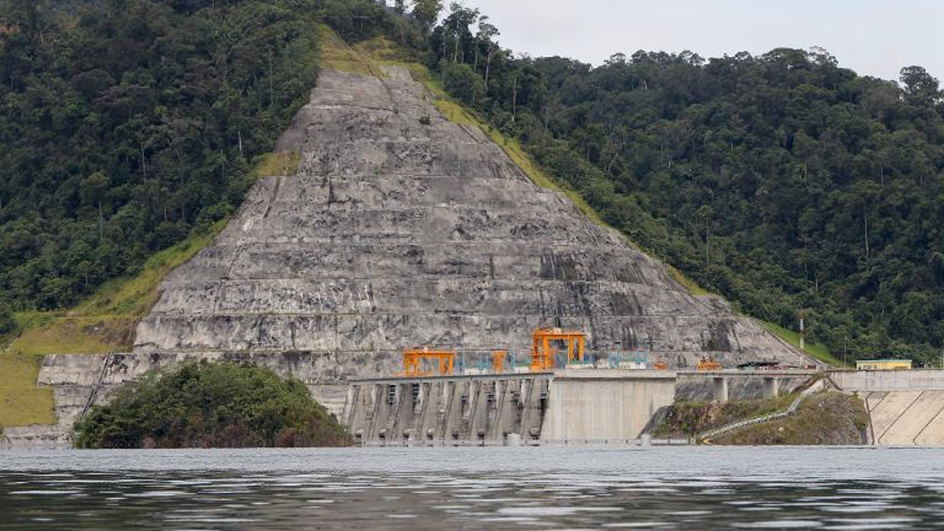 Malaysia's government agreed to pay $133 million in compensation to two foreign contractors for losses incurred in the problem-plagued Bakun Dam, shown here in 2011, an audit has revealed