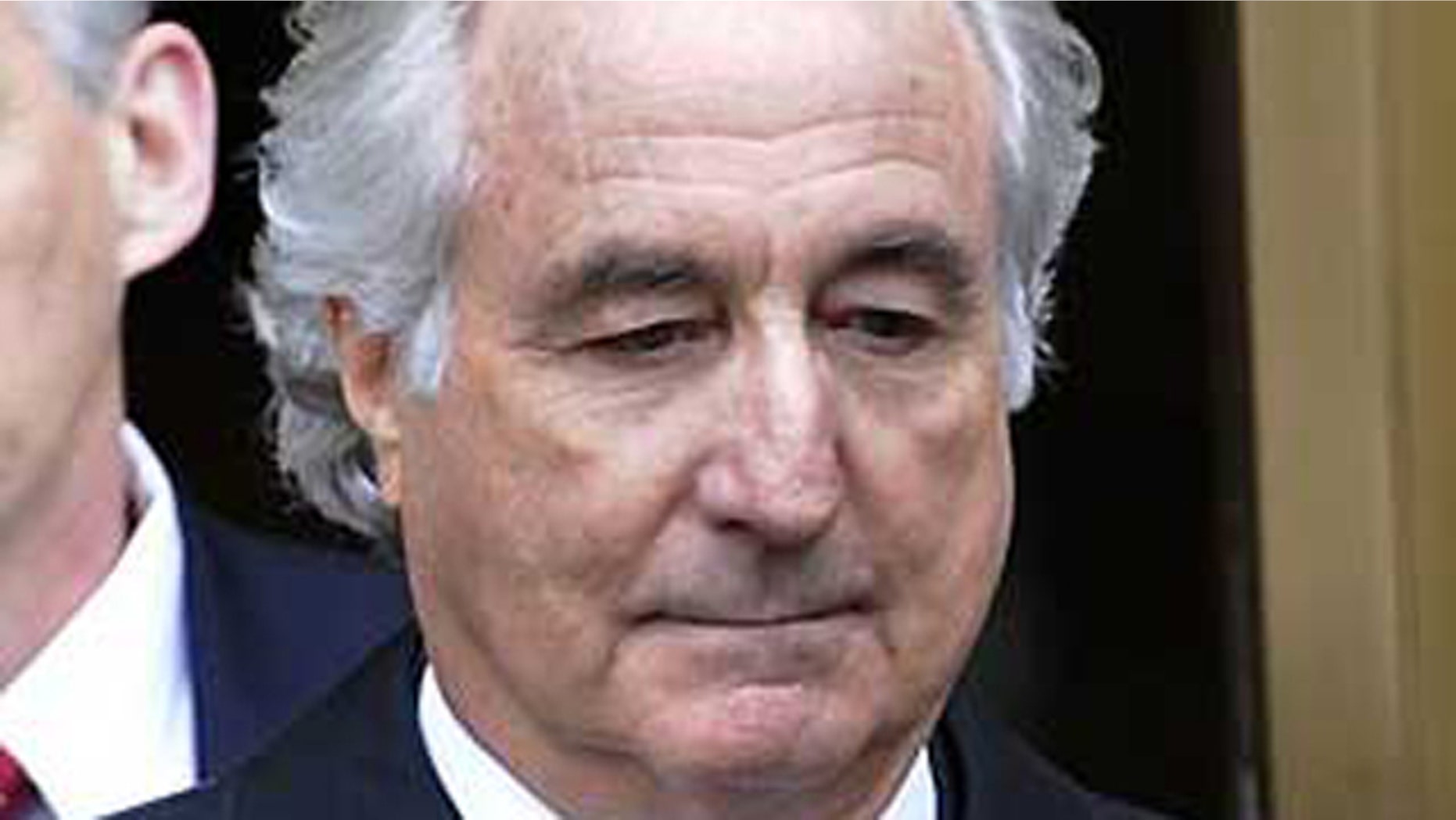 In this March 10, 2009 file photo, Bernard Madoff exits Manhattan federal court in New York.