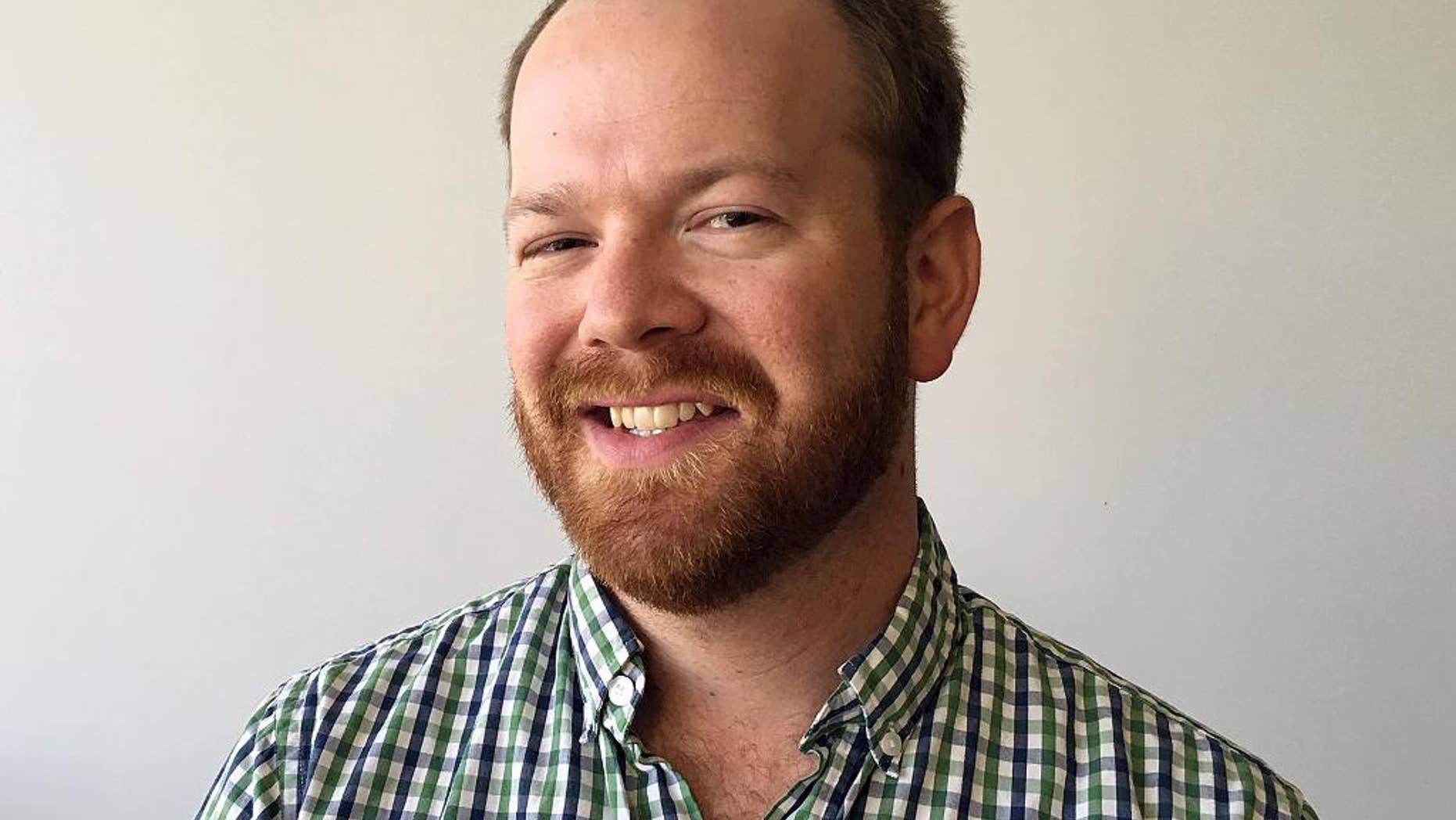 In this Dec 19, 2016 photo, Adam Kealoha Causey is seen in Phoenix, Ariz. Causey, an Associated Press newsman in Phoenix, has been named administrative correspondent in Oklahoma City. In his new role, Causey will oversee AP reporters in Oklahoma City and Tulsa. (AP Photo/Anna Jo Bratton)