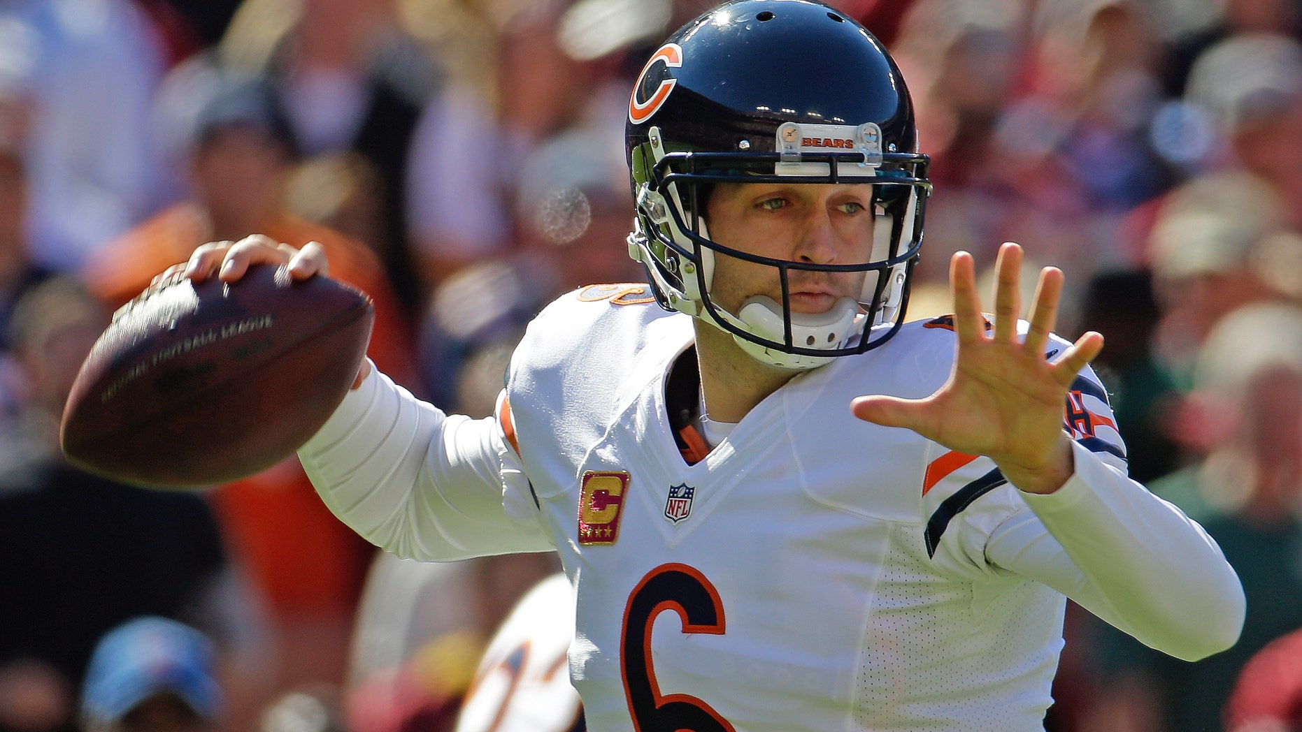 Chicago Bears quarterback Jay Cutler passes during the first half of a NFL football game against the Washington Redskins in Landover, Md., Sunday, Oct. 20, 2013. (AP Photo/Alex Brandon)