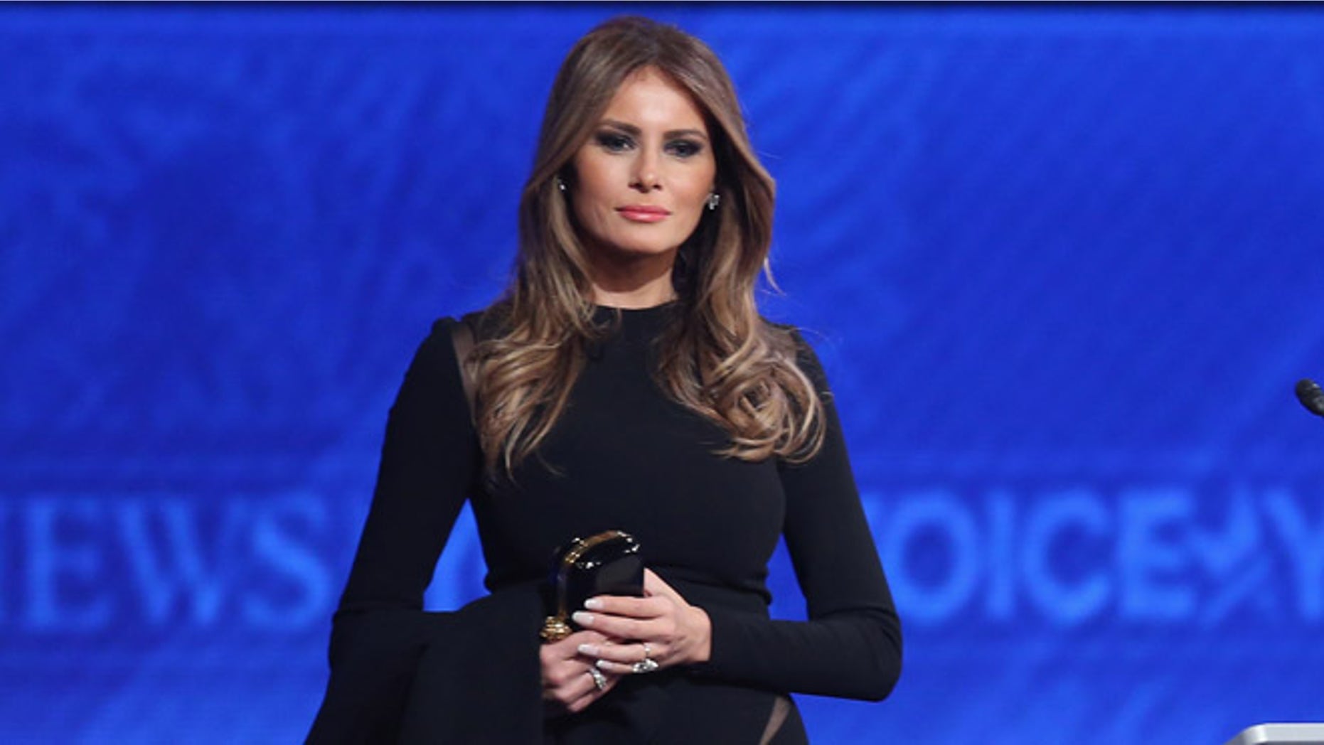 MANCHESTER, NH - FEBRUARY 06: Melania Trump, wife of Republican presidential candidate Donald Trump, stands on stage following the Republican presidential debate at St. Anselm College February 6, 2016 in Manchester, New Hampshire. Sponsored by ABC News and the Independent Journal Review, this is the final televised debate before voters go to the polls for the New Hampshire primary on February 9. (Photo by Joe Raedle/Getty Images)