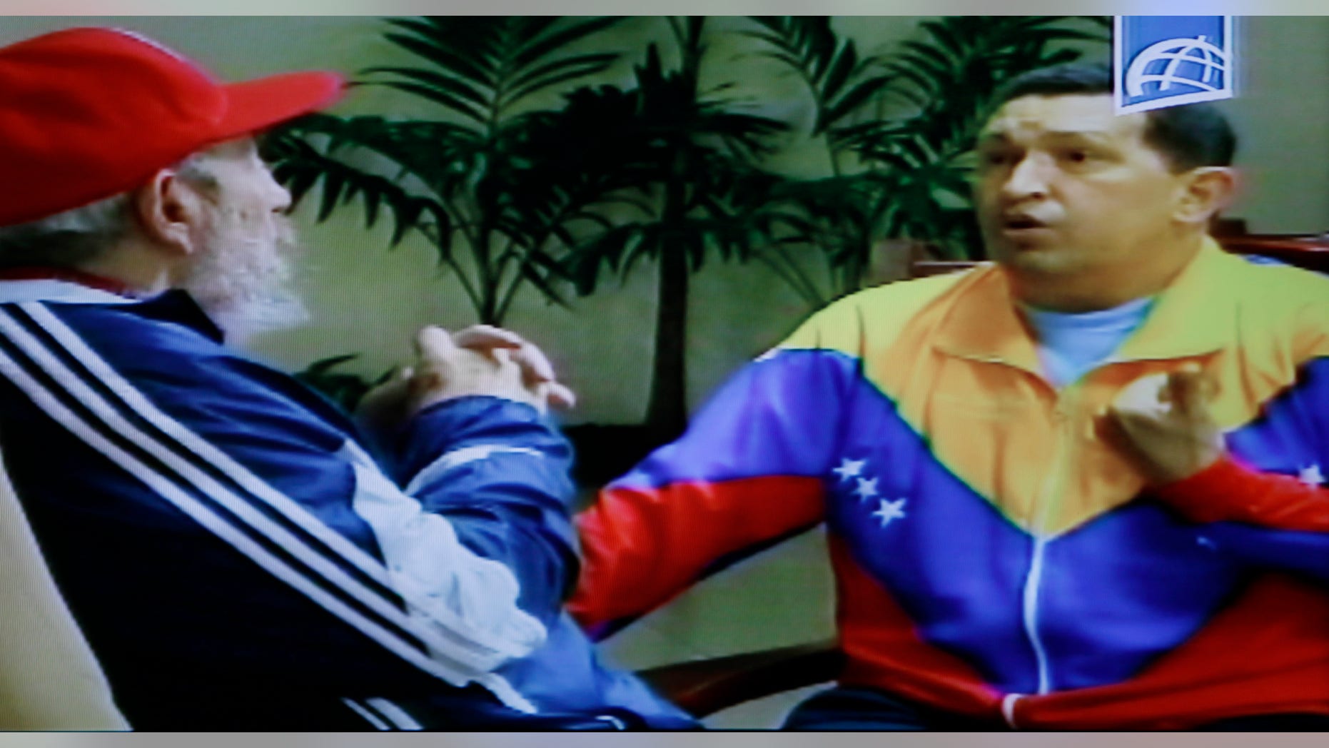 June 28: In this frame grab taken from video shown on Cuban state television, Cuba's Fidel Castro, left, speaks with Venezuela's President Hugo Chavez in an unknown location in Havana, Cuba.