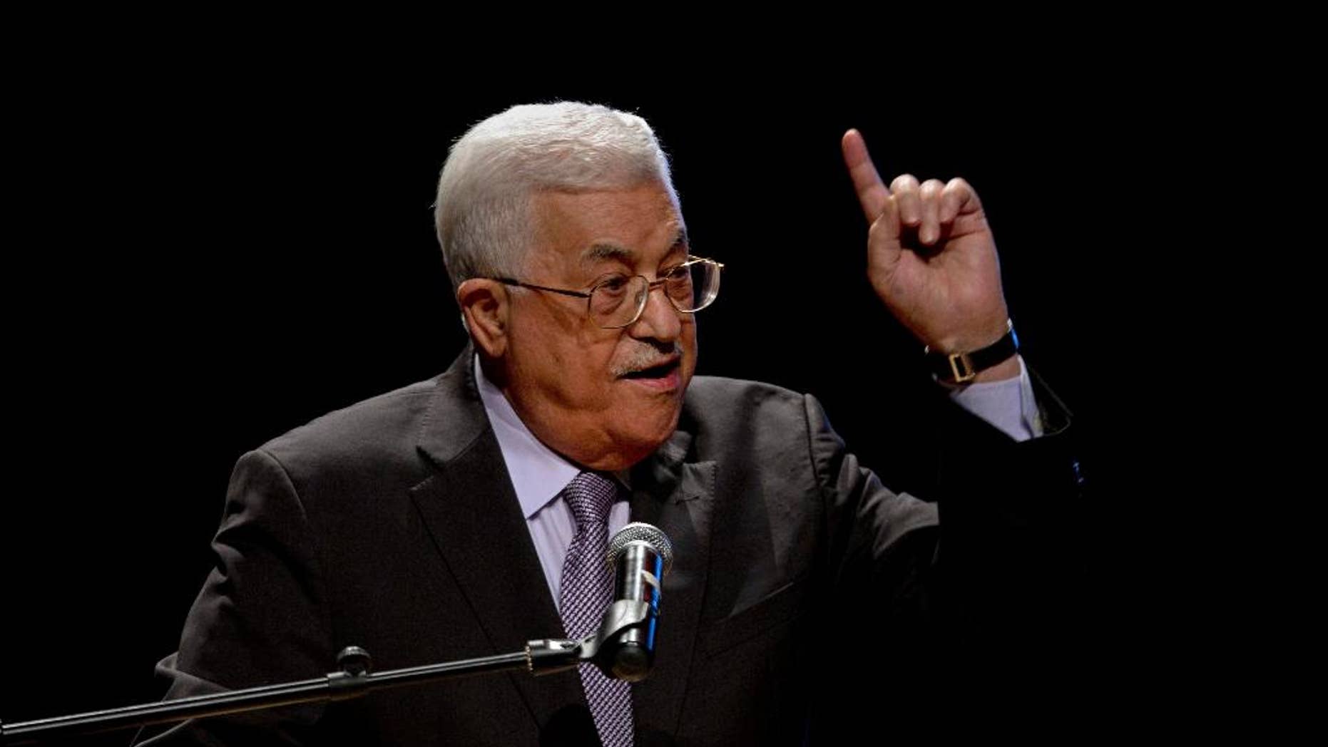 FILE -- In this Oct. 1, 2016 file photo, Palestinian President Mahmoud Abbas, speaks during a conference in the West Bank City of Bethlehem. Abbas told Palestinian diplomats in Bahrain on Wednesday, April 12, 2017, that he will take "unprecedented steps" to end the political division between his West Bank-based autonomy government and the Hamas-run Gaza Strip. Measures will likely include more financial pressure on Gaza, after he recently slashed salaries of 60,000 ex-civil servants and members of the security forces by one-third. (AP Photo/Majdi Mohammed, File)