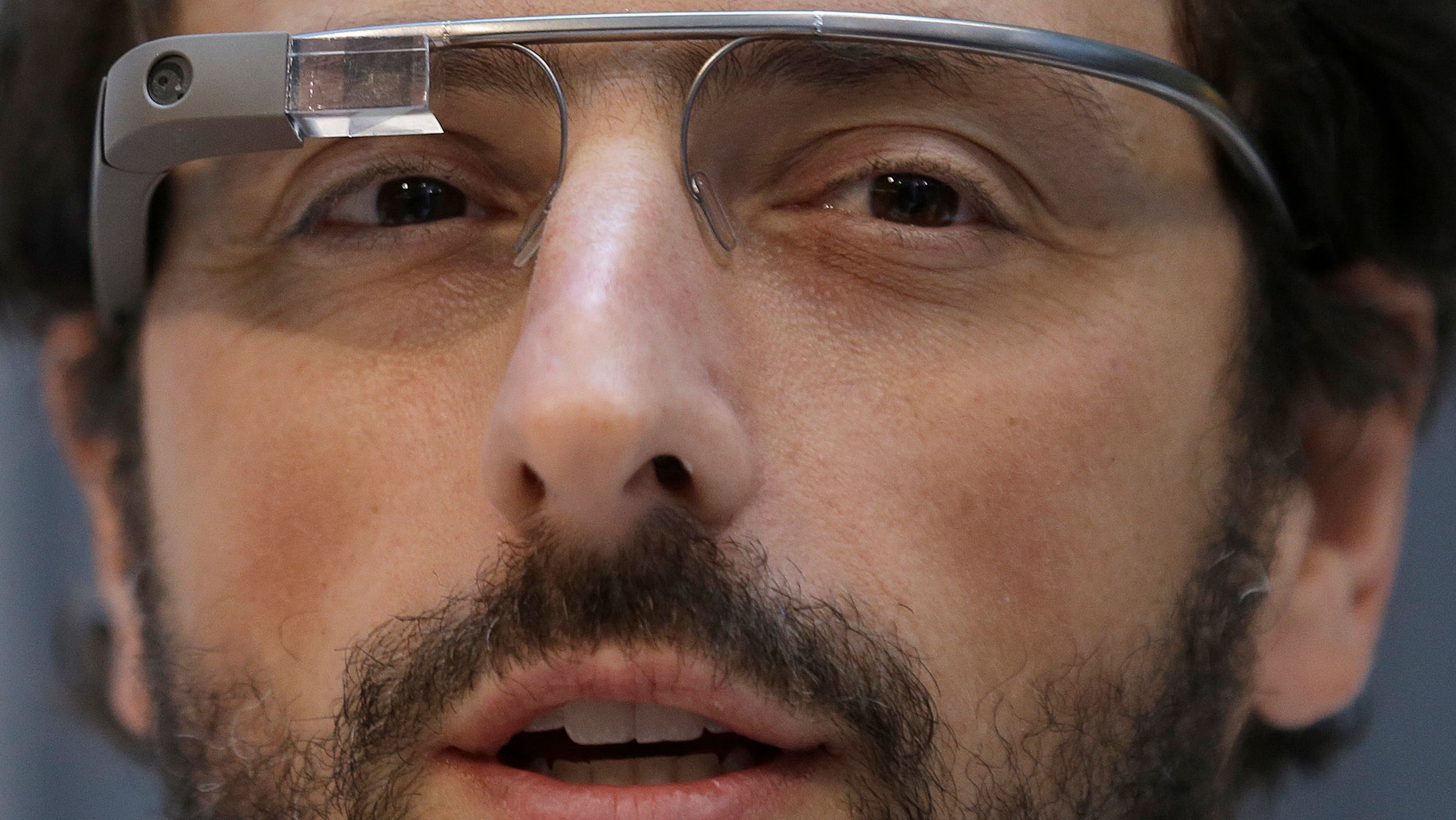 Google co-founder Sergey Brin wears Google Glass glasses at an announcement for the Breakthrough Prize in Life Sciences at Genentech Hall on UCSFs Mission Bay campus in San Francisco, Wednesday, Feb. 20, 2013. (AP Photo/Jeff Chiu)