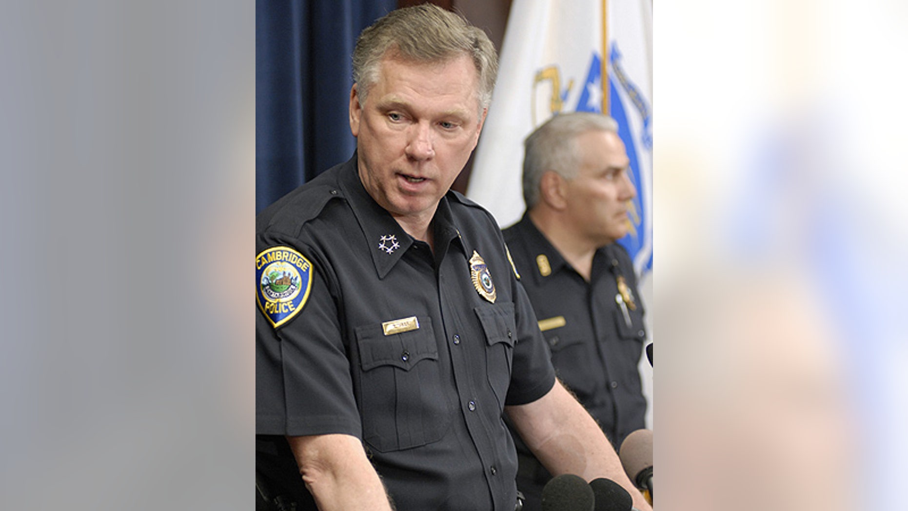 July 23: Commissioner Robert Haas speaks to reporters at Cambridge, Mass., Police headquarters about the actions of Cambridge Sgt. James Crowley.