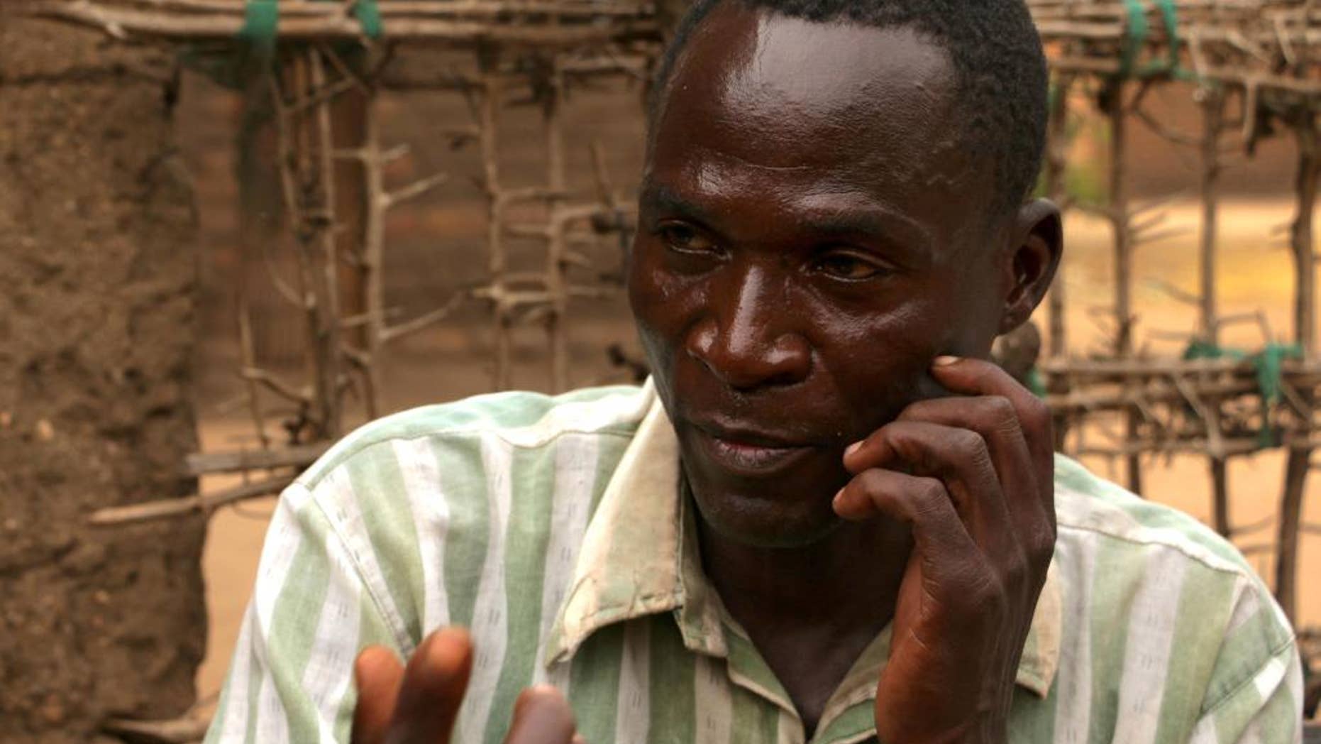 In this photo taken Thursday, June 30, 2016, Eric Aniva is photographed near Blantyre, Malawi. Malawian police on Tuesday July 26, 2016 have arrested Aniva who said he was hired by families to have sex with more than 100 young women, including children, in what was described as ritual cleansing. The country's president ordered the man's arrest after he told international media about his actions and said he is HIV-positive. (AP Photo/Eldson Chagara)