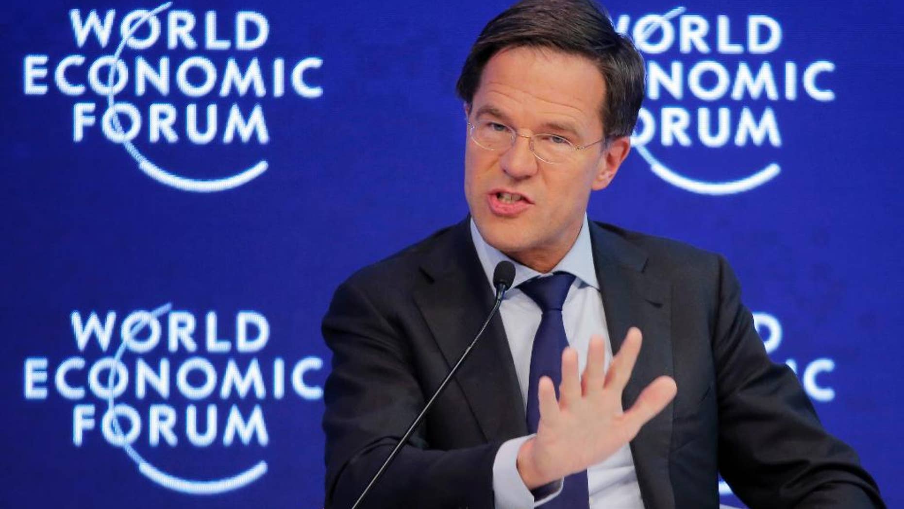 CORRECTS DATE - Dutch Prime Minister Mark Rutte speaks on the third day of the annual meeting of the World Economic Forum in Davos, Switzerland, Thursday, Jan. 19, 2017. (AP Photo/Michel Euler)