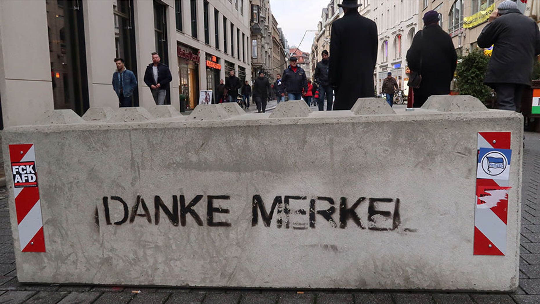 Dec. 17, 2017: Graffiti on a concrete barrier reads "Thanks Merkel" in German at a Christmas market in the eastern German city of Leipzig, Germany.