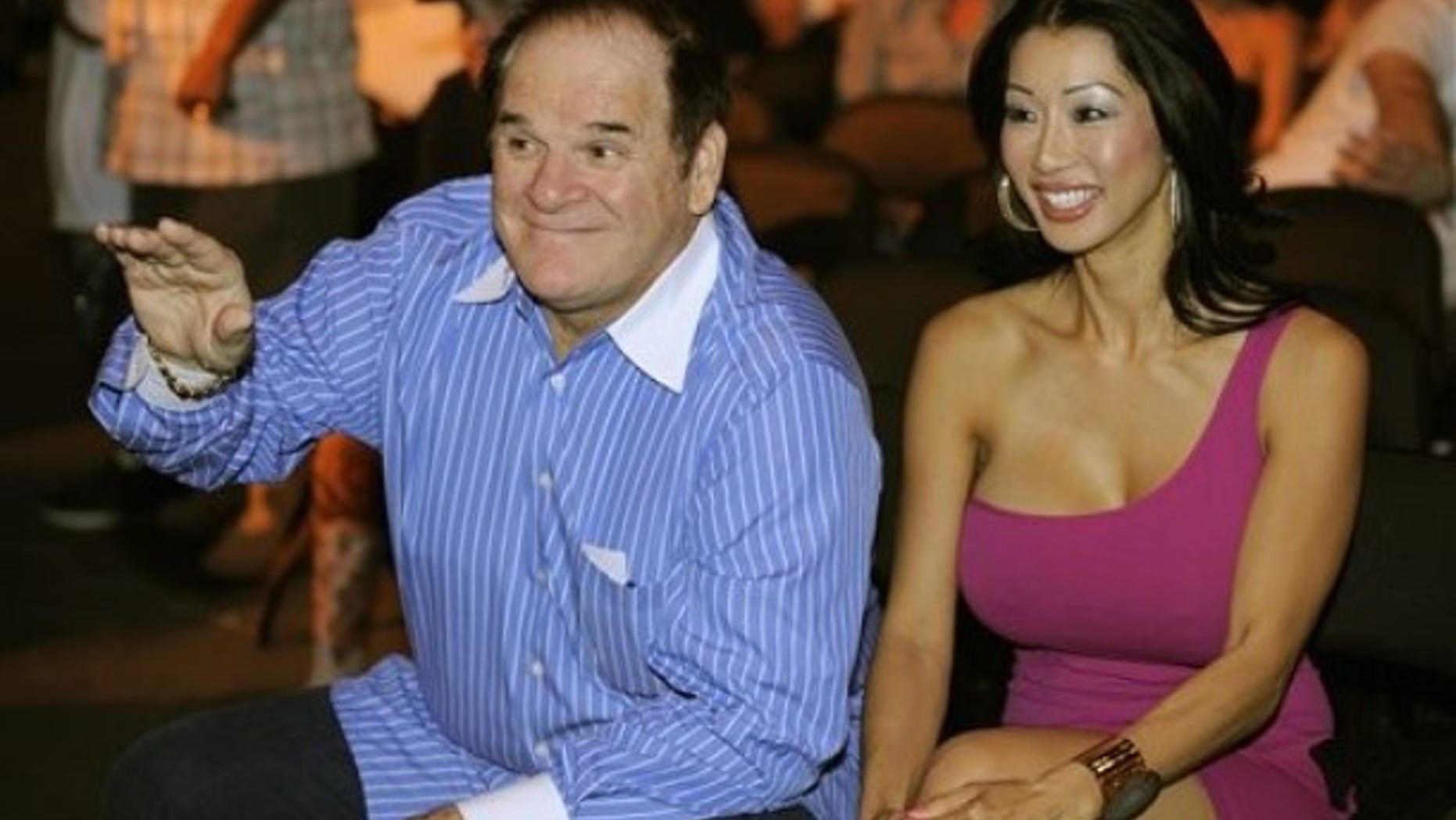 Sept, 26, 2009: Former major league baseball player Pete Rose, left, is joined by an unidentified companion before the start of a heavyweight fight between Vitali Klitschko and Chris Arreola in Los Angeles. (AP)