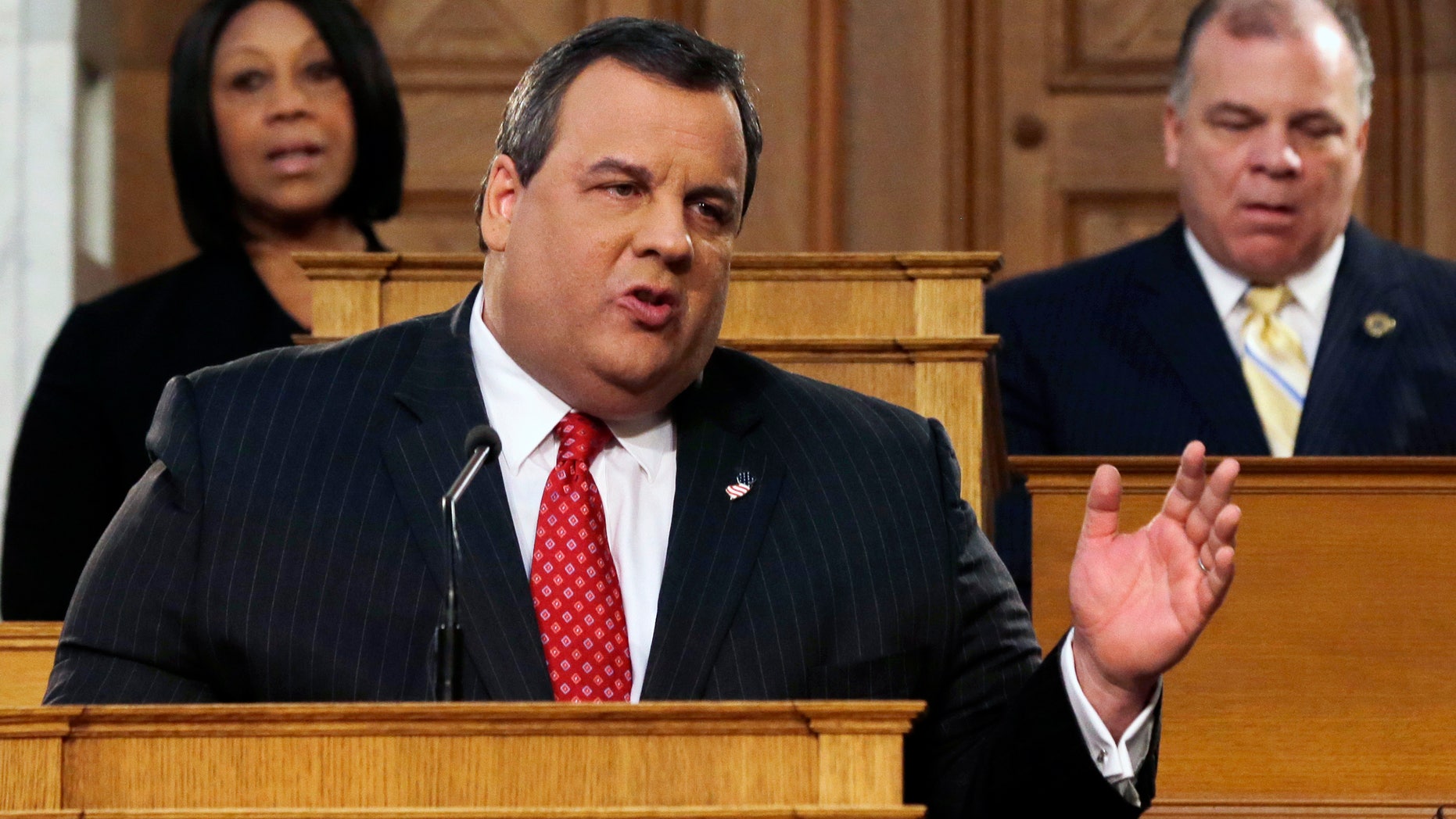 New Jersey Senate President Stephen M. Sweeney, right, D-Thorofare,N.J., and Assembly Speaker Sheila Y. Oliver, left, D-East Orange, N.J., listen as Gov. Chris Christie delivers his State Of The State address at the Statehouse, Tuesday, Jan. 8, 2013, in Trenton, N.J. Christie promised in his annual State of the State address Tuesday that New Jersey will be back "stronger than ever" after Superstorm Sandy and will do it without returning to its "old ways of wasteful spending and rising taxes." (AP Photo/Mel Evans)