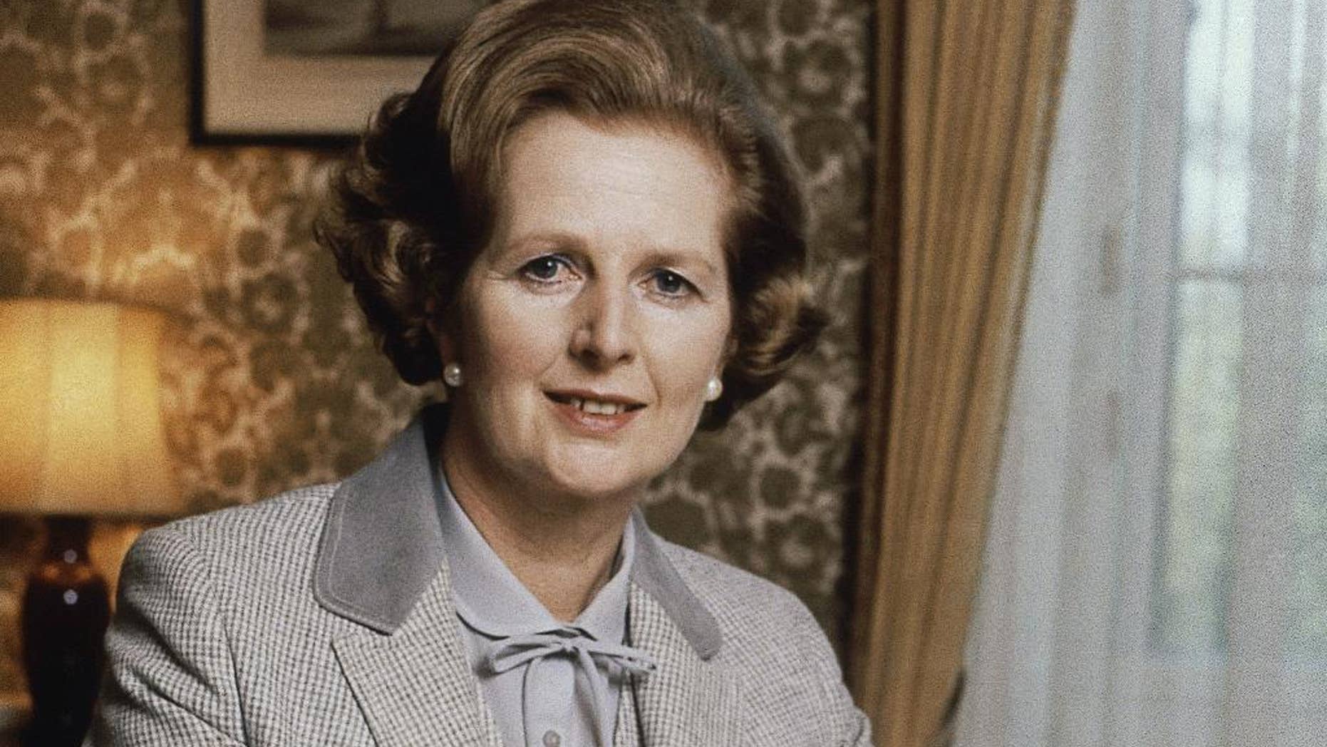 FILE - In this 1980 file photo, British Prime Minister Margaret Thatcher poses for a photograph in London. Newly released official papers show that former Prime Minister Margaret Thatcher’s government considered rebuilding Britain’s chemical weapons arsenal in the face of a Soviet threat in the early 1980s. (AP Photo/Gerald Penny, File)
