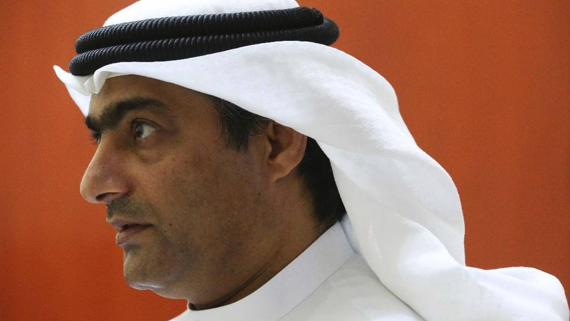 FILE - In this Aug. 25, 2016 file photo, human rights activist Ahmed Mansoor speaks to Associated Press journalists in Ajman, United Arab Emirates. Amnesty International says Ahmed Mansoor was detained overnight Monday, March 20, 2017 after a surprising overnight raid by 10 male and two female security officials who searched his children’s bedroom. Electronic devices were confiscated and his wife was not informed of where he was being taken. (AP Photo/Jon Gambrell, File)