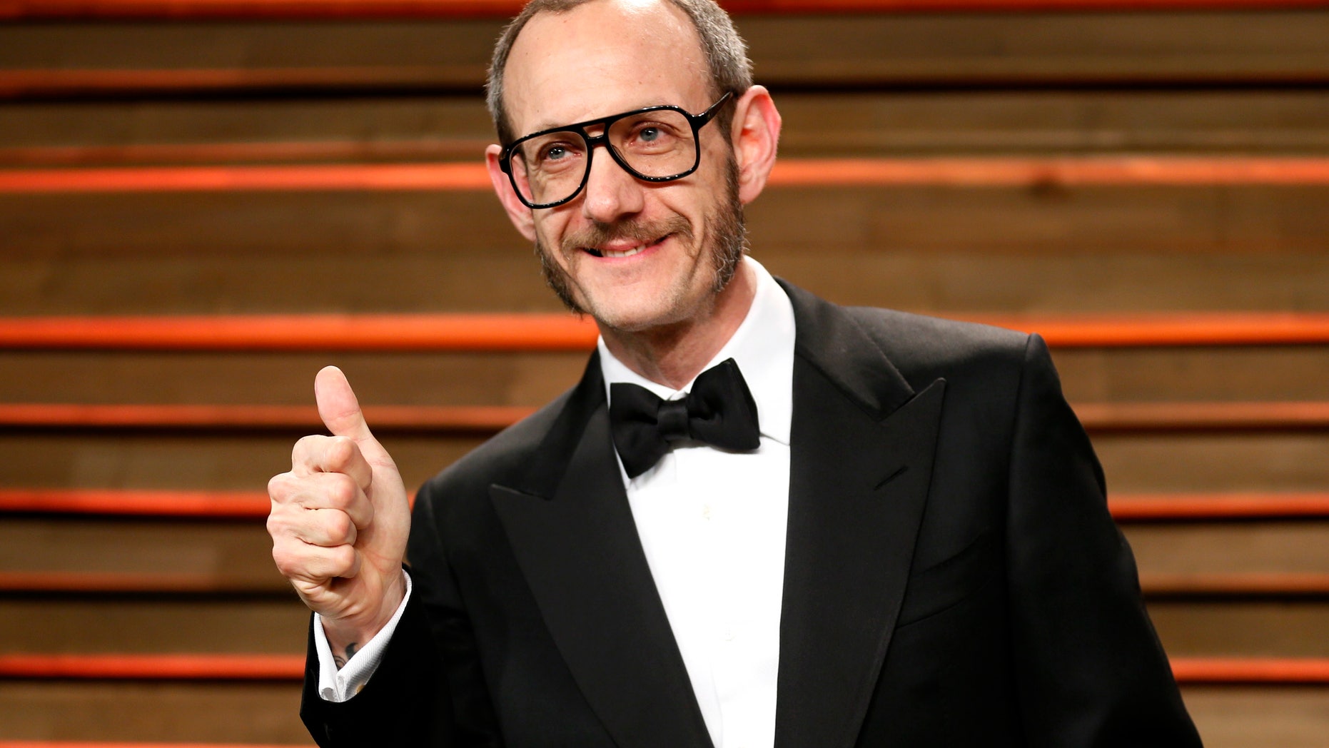 Photographer Terry Richardson arrives at the 2014 Vanity Fair Oscars Party in West Hollywood, California March 2, 2014.