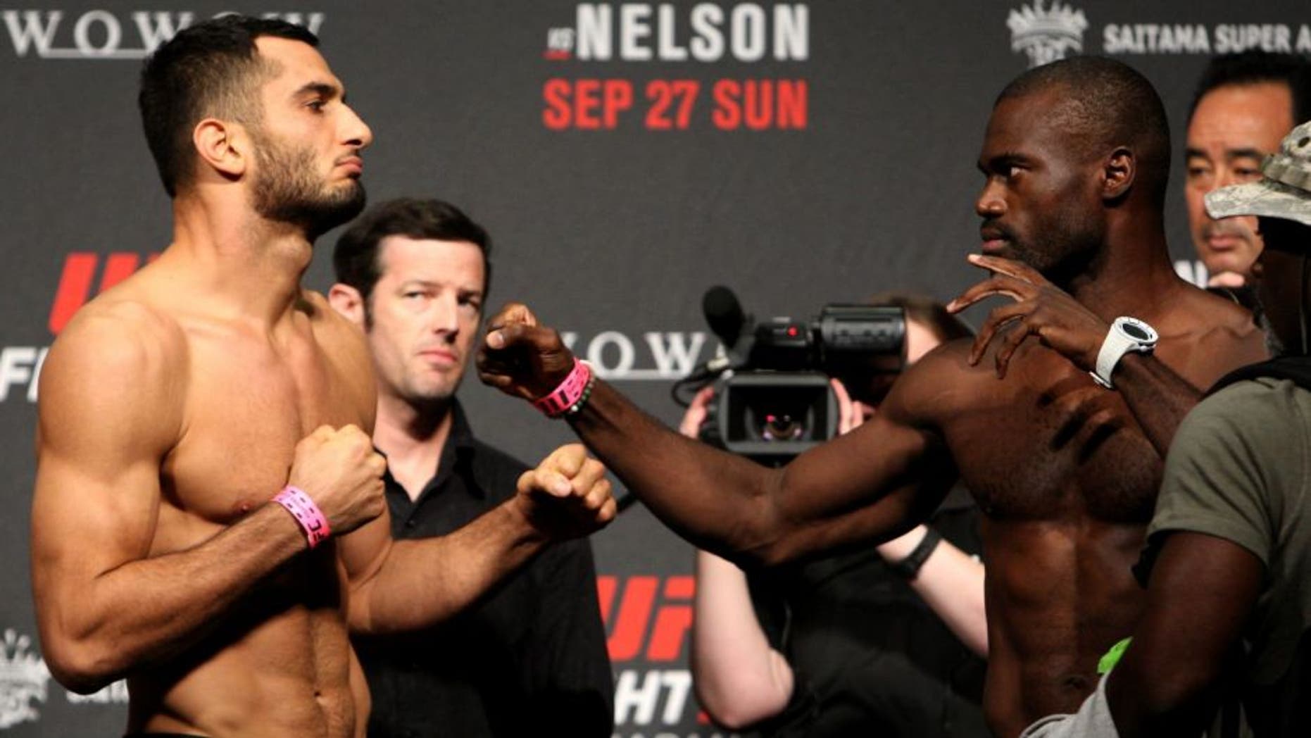 SAITAMA, JAPAN - SEPTEMBER 25: (L and R) Gegard Mousasi and Uriah Hall during the UFC weigh-in at the Saitama Super Arena on September 25, 2015 in Saitama, Japan. (Photo by Mitch Viquez/Zuffa LLC/Zuffa LLC via Getty Images)