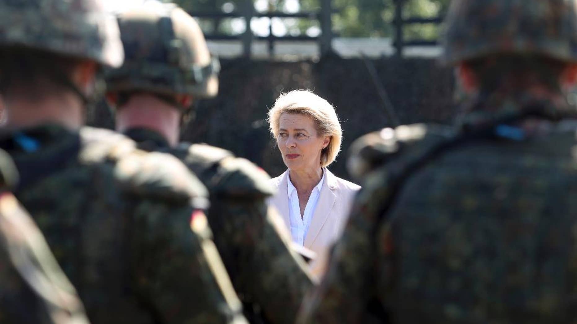 FILE - In this Aug. 16, 2016 file photo German Defence Minister Ursula von der Leyen speaks to soldiers from the German army in Weissenfels, Germany. Federal prosecutor's spokeswoman Frauke Koehler said that 27-year-old Maximilian T. was arrested in the southwestern city of Kehl on Tuesday, May 9, 2017 on charges of preparing an act of violence. (Sebastian Willnow/dpa via AP, file)
