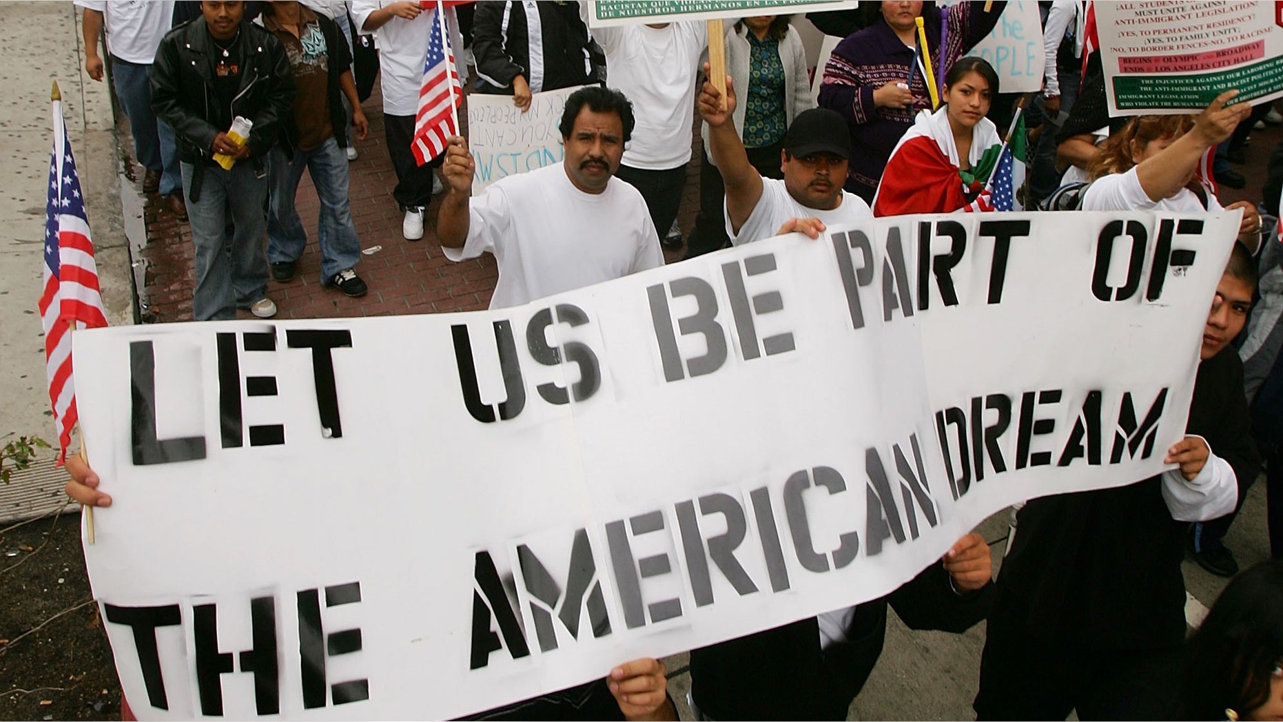 LOS ANGELES, CA - APRIL 15: Students and supporters march to call for amnesty for illegal immigrants on April 15, 2006 in Los Angeles, California. The 3,000 people who marched through downtown to City Hall particularly oppose House bill HR 4437 by Rep. F. James Sensenbrenner, R-Wisconsin that would increase penalties for immigrant smuggling, beef up penalties for undocumented immigrants who re-enter the United States, and require employers to report Social Security numbers to the Department of Homeland Security. The march is dedicated to Ontario, California student Anthony Soltero, 14, who committed suicide on March 30 after a school administrator allegedly told him he would be fined and jailed for participating in a student walkout in support of undocumented immigrants rights on March 28. (Photo by David McNew/Getty Images)