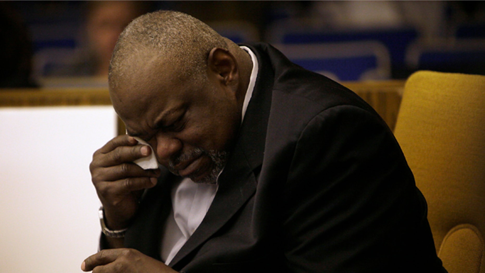 March 6, 2012: Grafton Peterson, father of the late Erin Peterson wipes away a tear after a photo of his daughter was shown to the jury during the wrongful death trial against the Commonwealth of Virginia and Virginia Tech at the Montgomery Circuit Court in Christiansburg, Va.