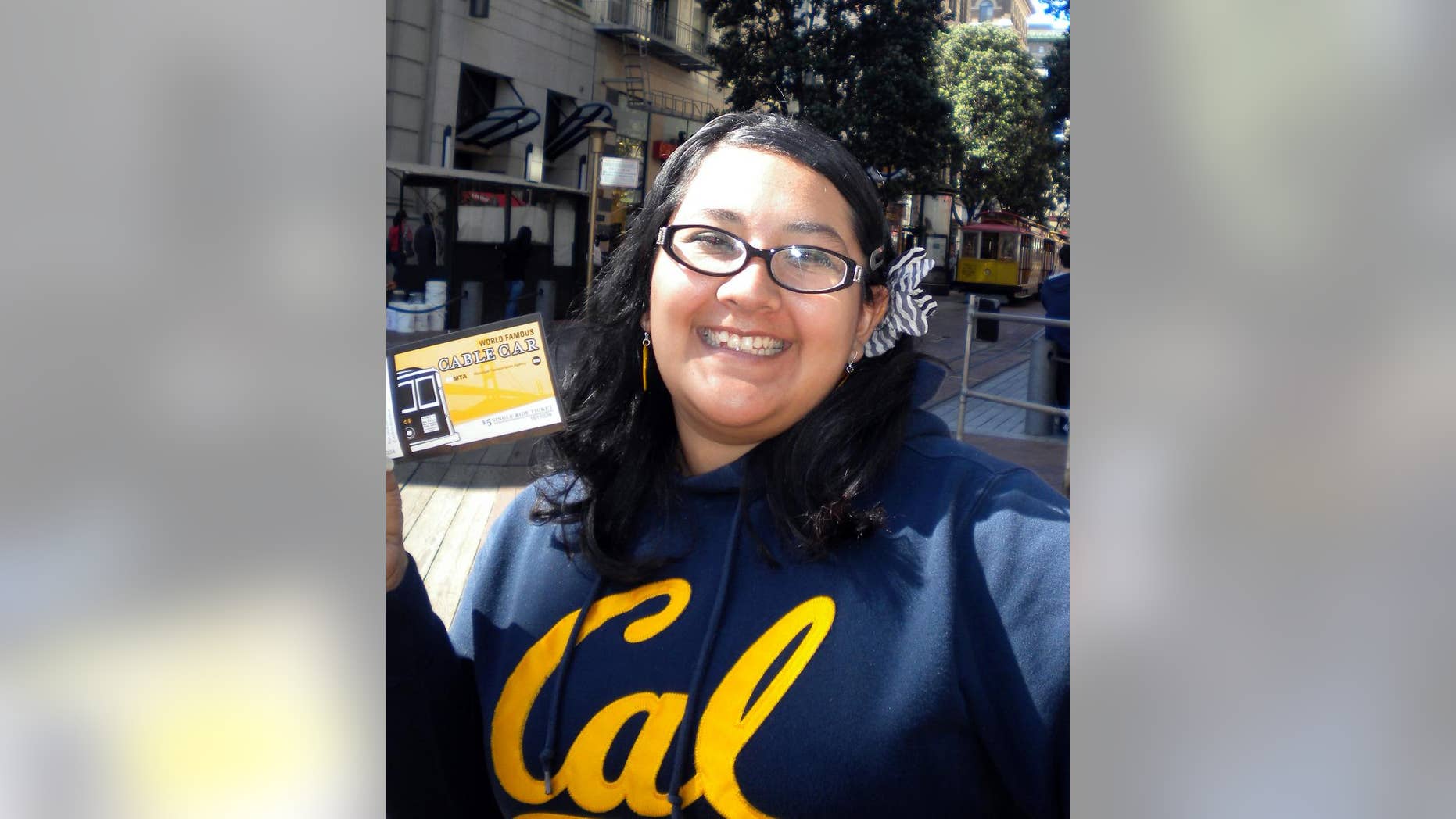 FILE - This undated file photo provided by Tatiana Ward shows Aurora Godoy during a trip to San Francisco. Godoy was killed during a Dec. 2, 2015, attack in San Bernardino, Calif. Los Angeles Harbor College says it will honor the memory of Godoy by awarding her a posthumous degree recognizing her as a member of its Class of 2016 during a board of trustees meeting Wednesday, May 11, 2016. (Tatiana Ward via AP, File)