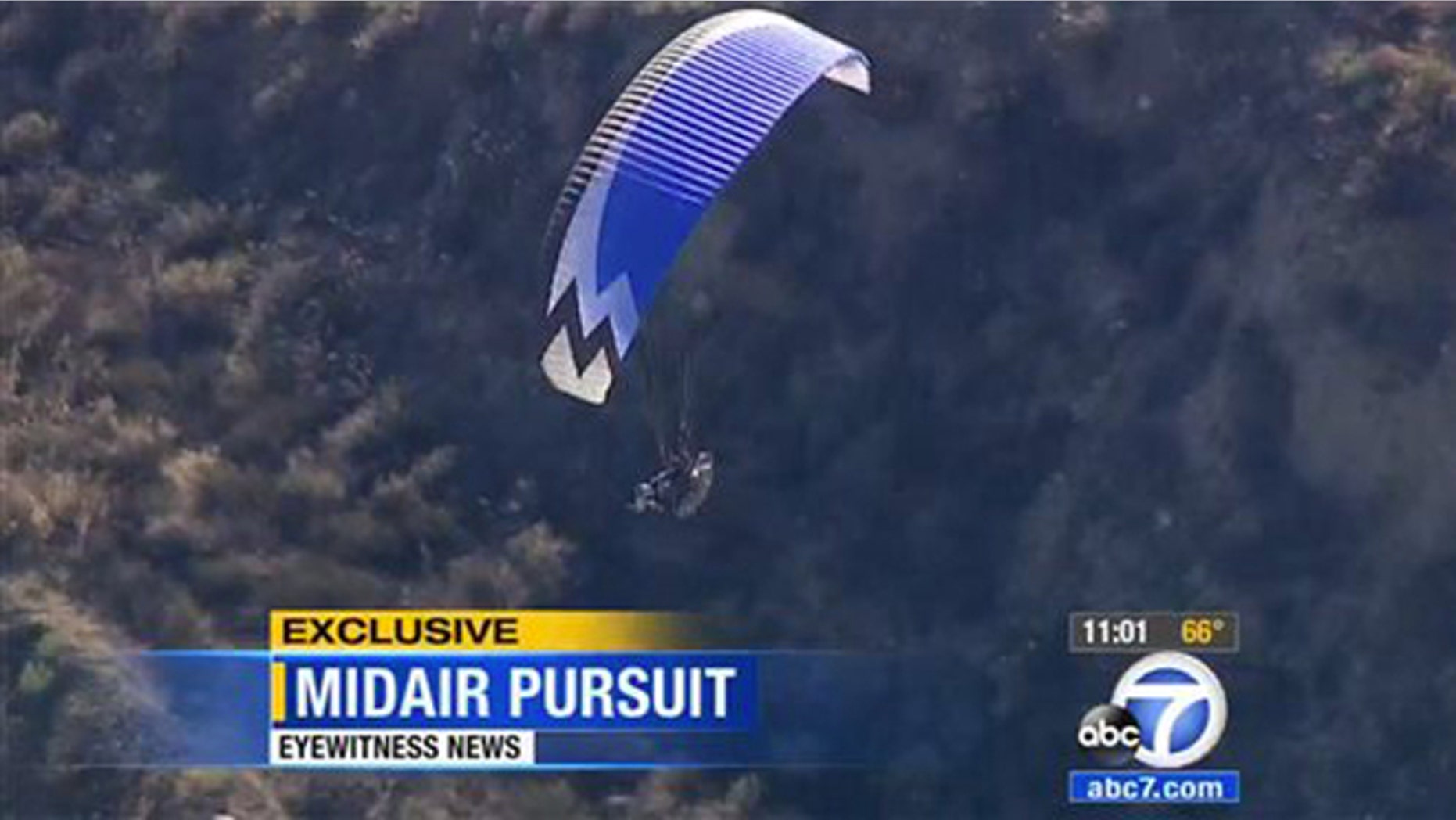 Monday, Aug. 10, 2015: In a frame from video provided by KABC-TV/abc7.com, Ron Nagin, the paraglider pilot, soars near Los Angeles County's Pitchess Detention Center. Jail deputies saw the fly-by and a Los Angeles County Sheriff's helicopter began following him.