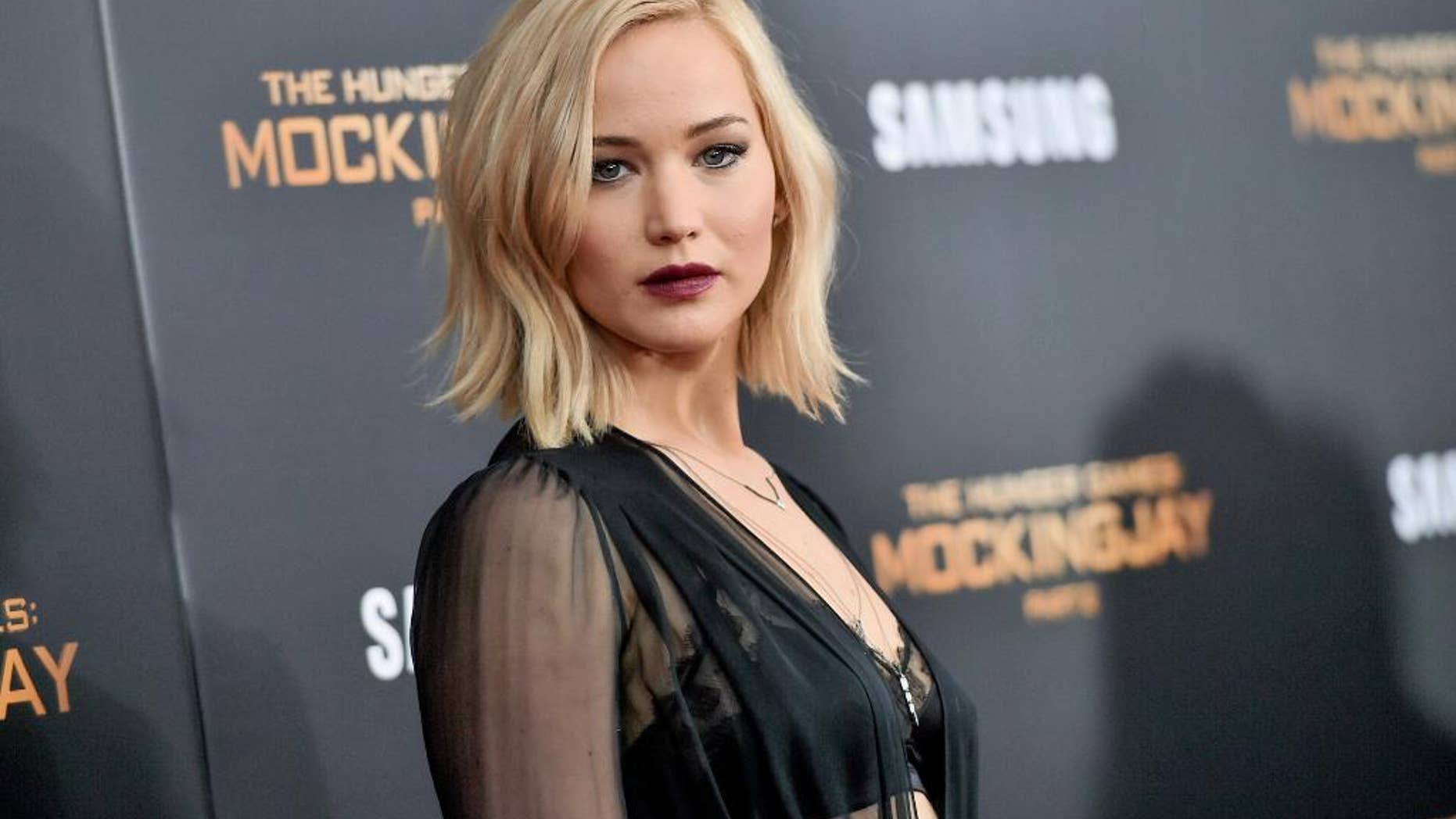 FILE - In this Nov. 18, 2015, file photo, actress Jennifer Lawrence attends a special screening of "The Hunger Games: Mockingjay Part 2" at the AMC Loews Lincoln Square in New York. Lawrence topped Forbes magazine’s list of the world’s highest-paid actress, banking $46 million between June 1, 2015, and June 1, 2016, thanks to her paycheck for the final “Hunger Games” installment. Lawrence out-earned second-ranked Melissa McCarthy with $33 million and Scarlett Johansson at No. 3 with $25 million.(Photo by Evan Agostini/Invision/AP, File)