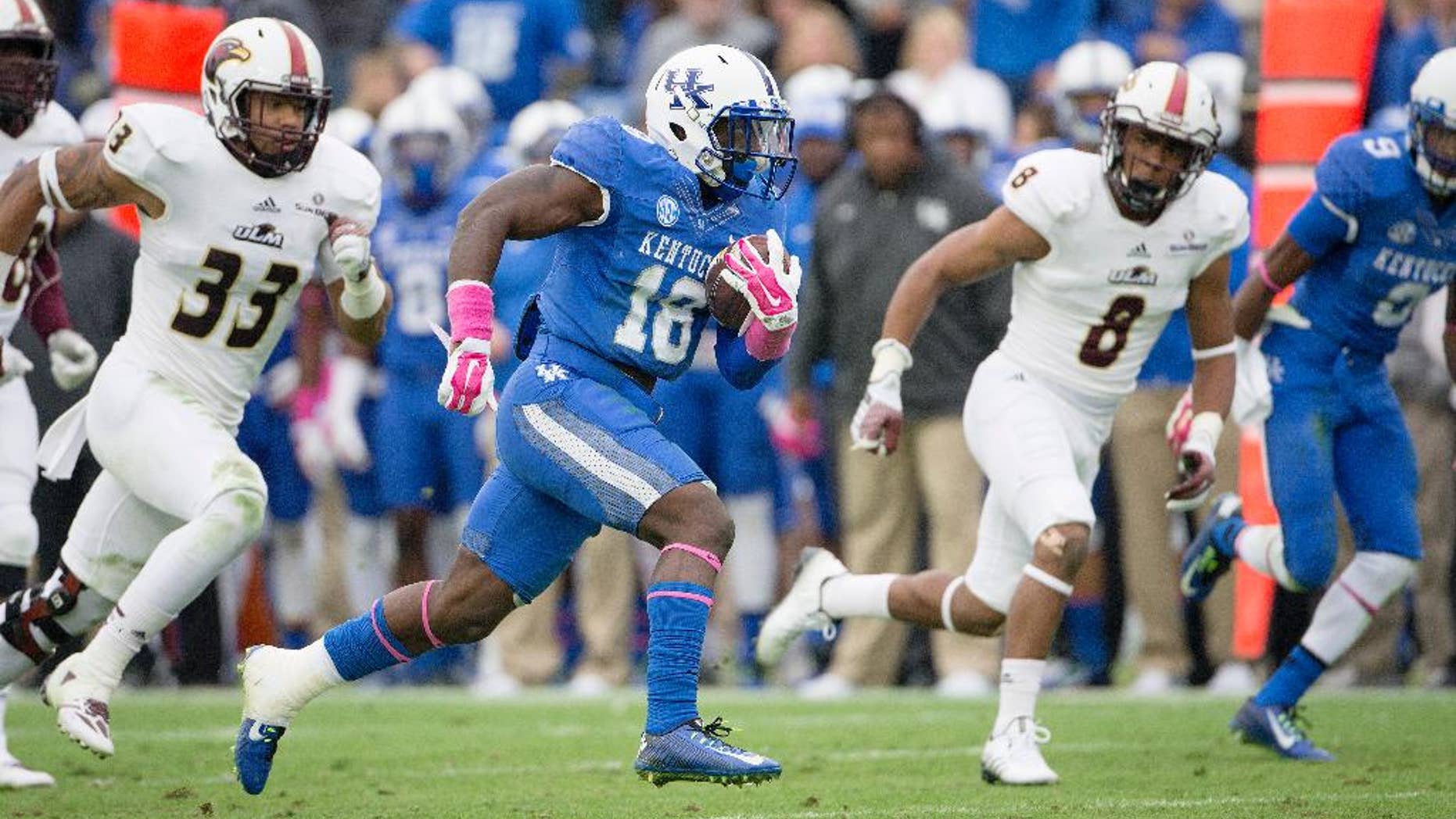 Kentucky running back Stanley Williams runs 58 yards for a touchdown during the second half of an NCAA college football game against Louisiana Monroe in Lexington, Ky., Saturday, Oct. 11, 2014. Kentucky won the game 48-14. (AP Photo/David Stephenson)