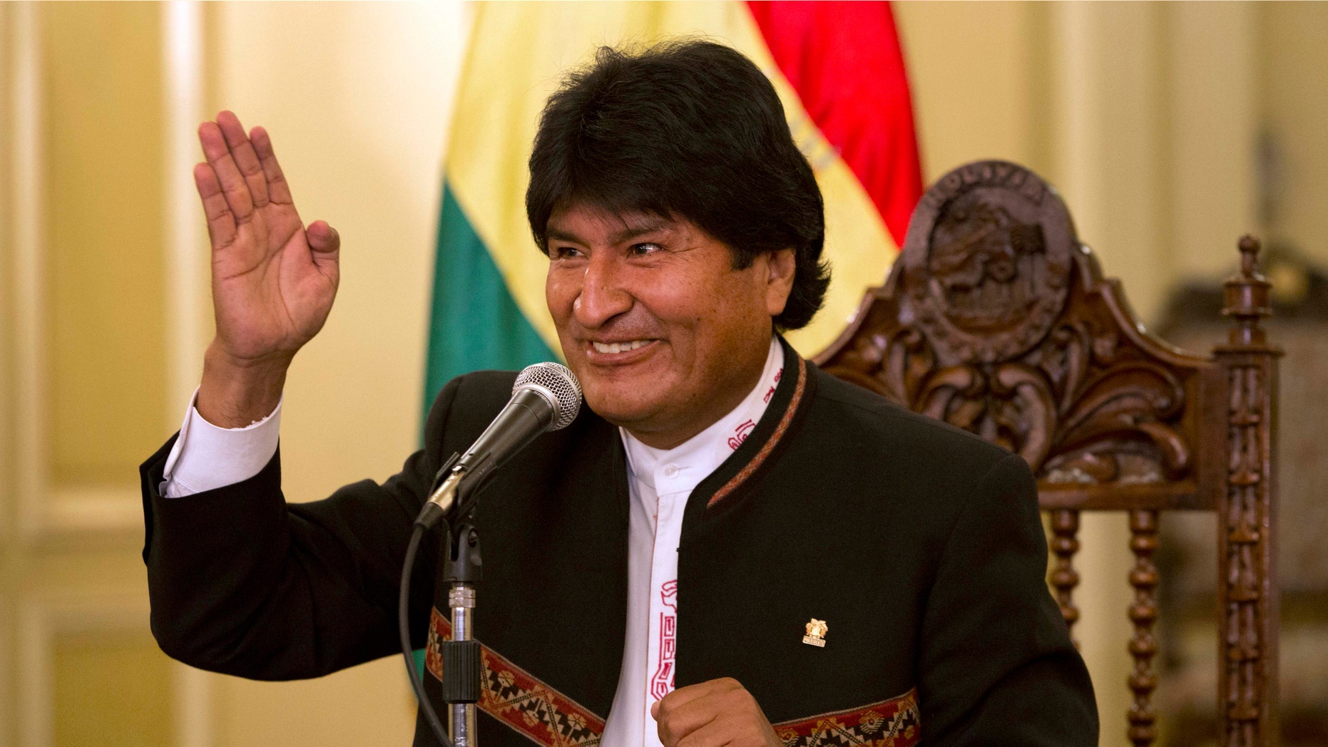 Bolivia's President Evo Morales speaks during a news conference at Government Palace in La Paz, Bolivia, Monday, Oct. 13, 2014. Morales coasted to victory in Bolivia's Sunday presidential elections, winning an unprecedented third term as voters rewarded the former coca grower for delivering economic and political stability in what has traditionally been one of South America's most ungovernable nations. (AP Photo/Martin Mejia)