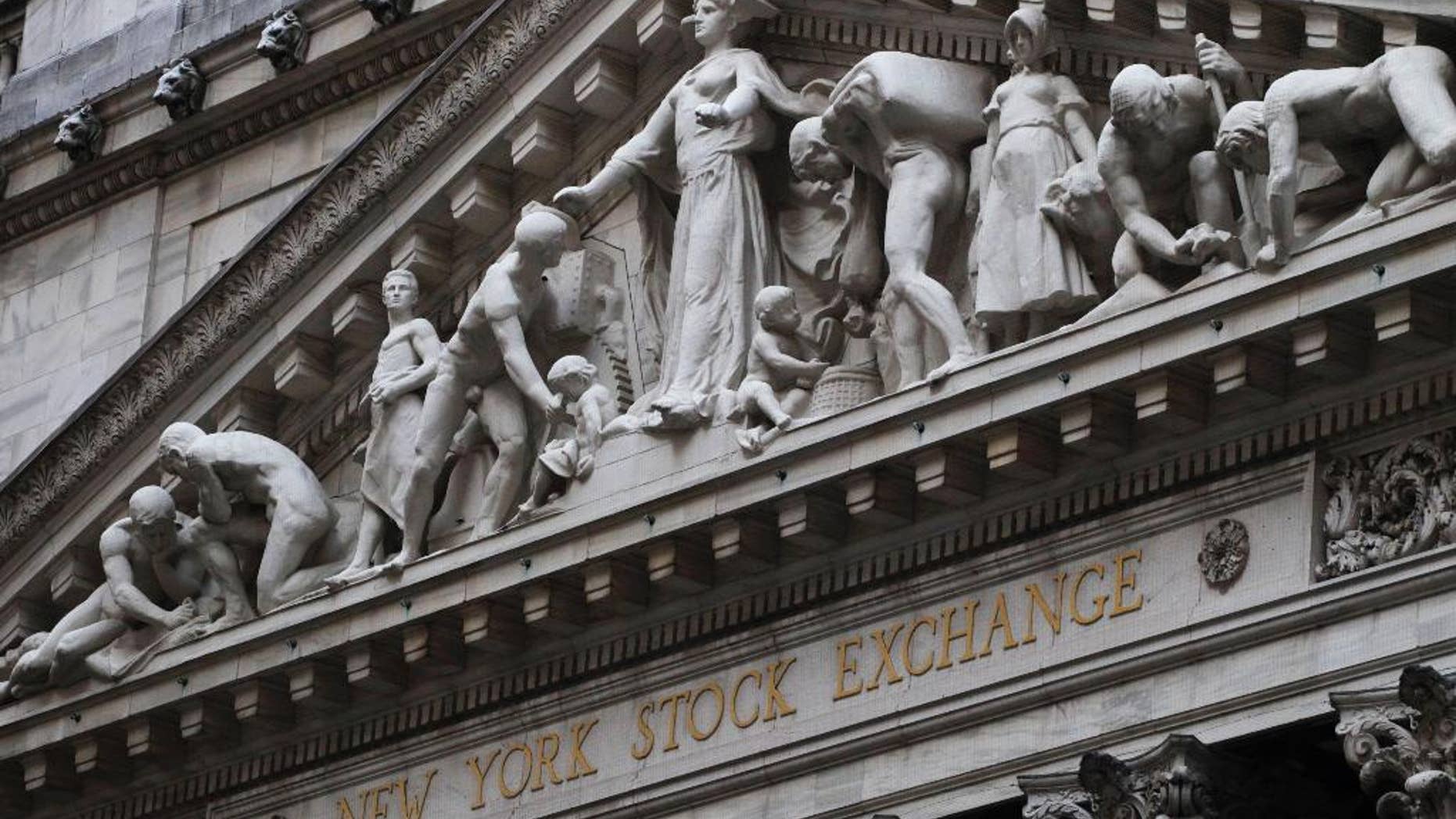 FILE - This Aug. 19, 2013 file photo shows the New York Stock Exchange in New York. European stock markets turned lower on Friday, Aug. 22, 2014, while Wall Street was expected to open flat, amid concerns of an escalation in the Ukrainian crisis after a Russian aid convoy entered the country. (AP Photo/Mark Lennihan, File)