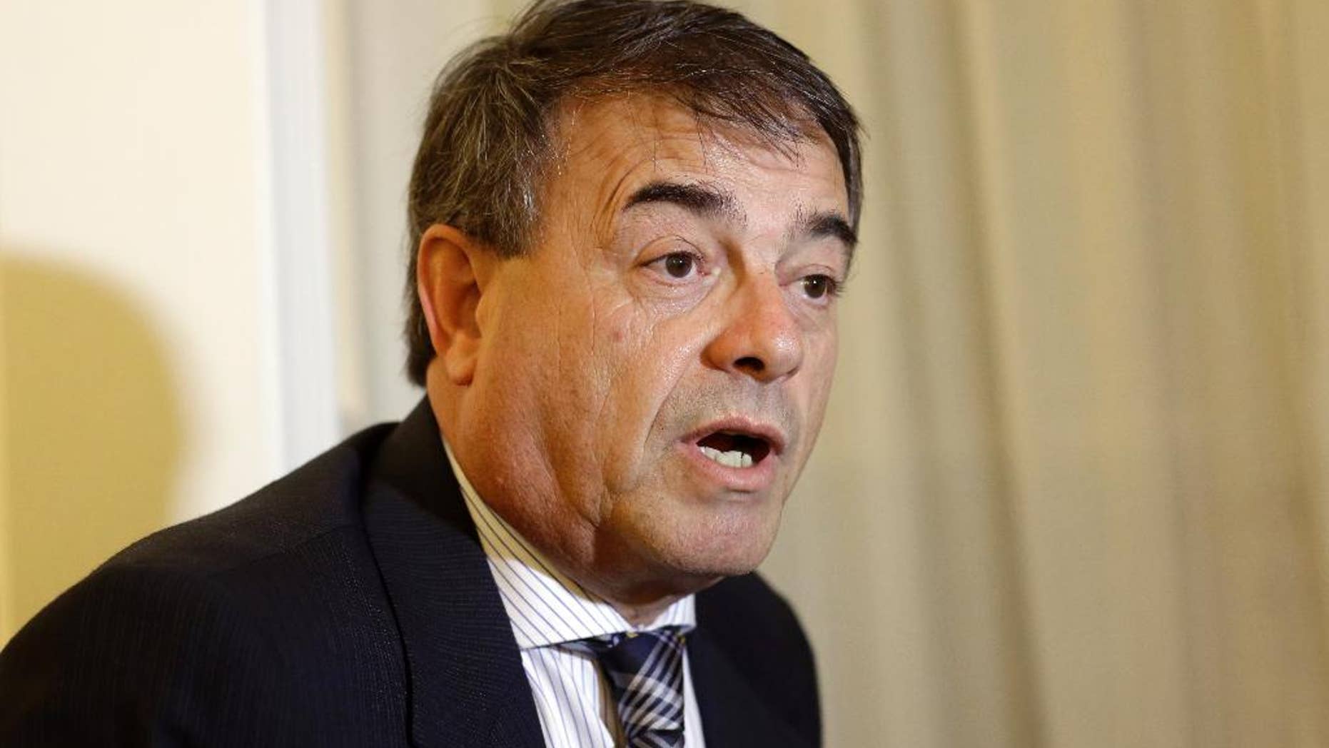 Lawyer Santiago Blanco Bermudez speaks during an interview in Buenos Aires, Argentina on the evening of Wednesday, April 22, 2015. Blanco Bermudez, the lawyer for Antonio Stiuso, Argentina's most famous spy master, said his client has fled the country because of threats on his life and that the government is trying to sully his reputation following the mysterious death of prosecutor Alberto Nisman. Stiuso oversaw a vast wire-tapping operation and had assisted Nisman in his investigation of the 1994 bombing of a Jewish community centre. (AP Photo/Victor R. Caivano)