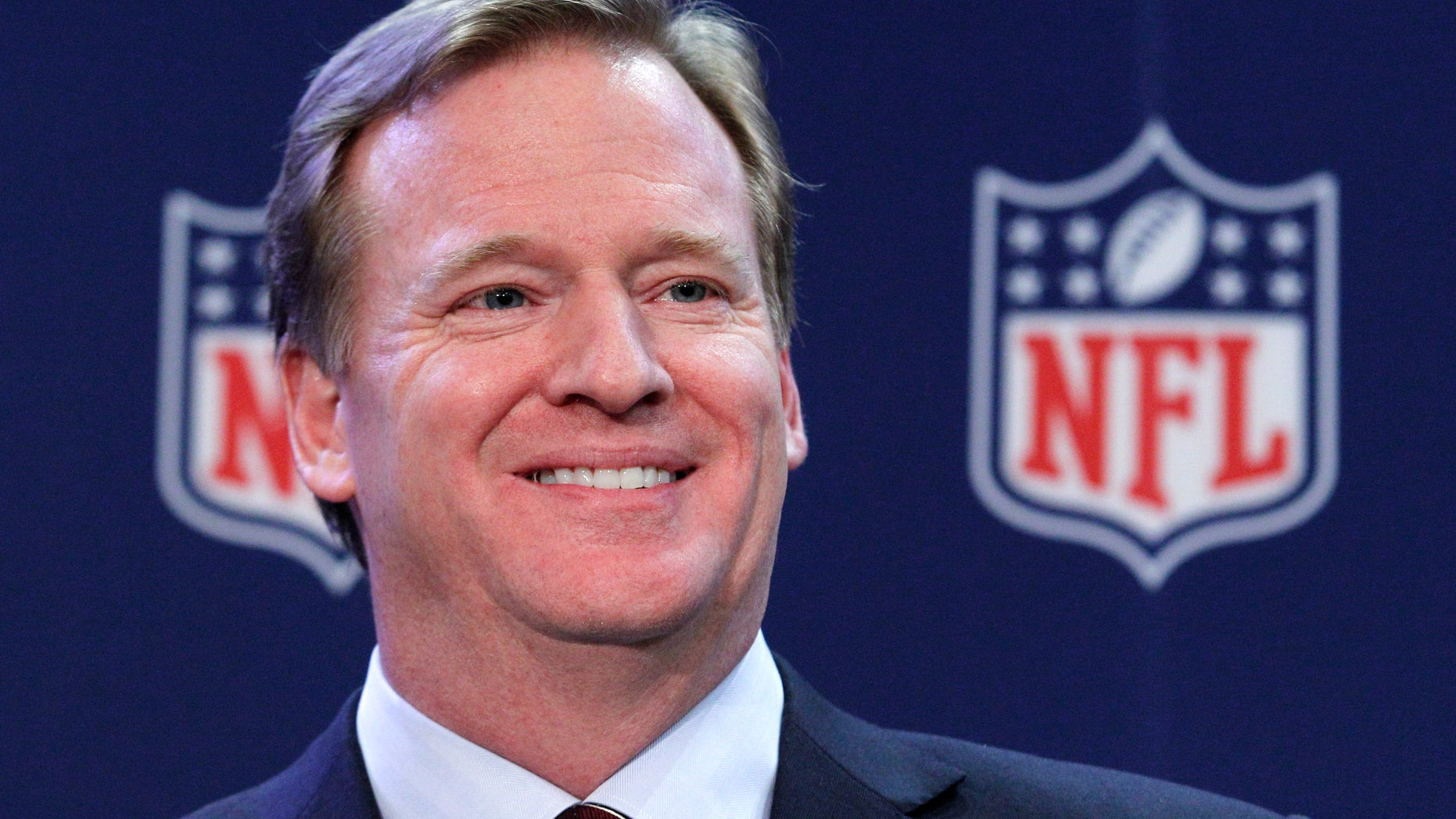 FILE - In this Dec. 12, 2012 file photo, NFL Commissioner Roger Goodell smiles during a news conference after the NFL owners meeting in Irving, Texas. Roger Goodell was paid $29.49 million by NFL owners in 2011, nearly triple his compensation from the previous year. Goodell earned $11.6 million in 2010. (AP Photo/LM Otero, File)