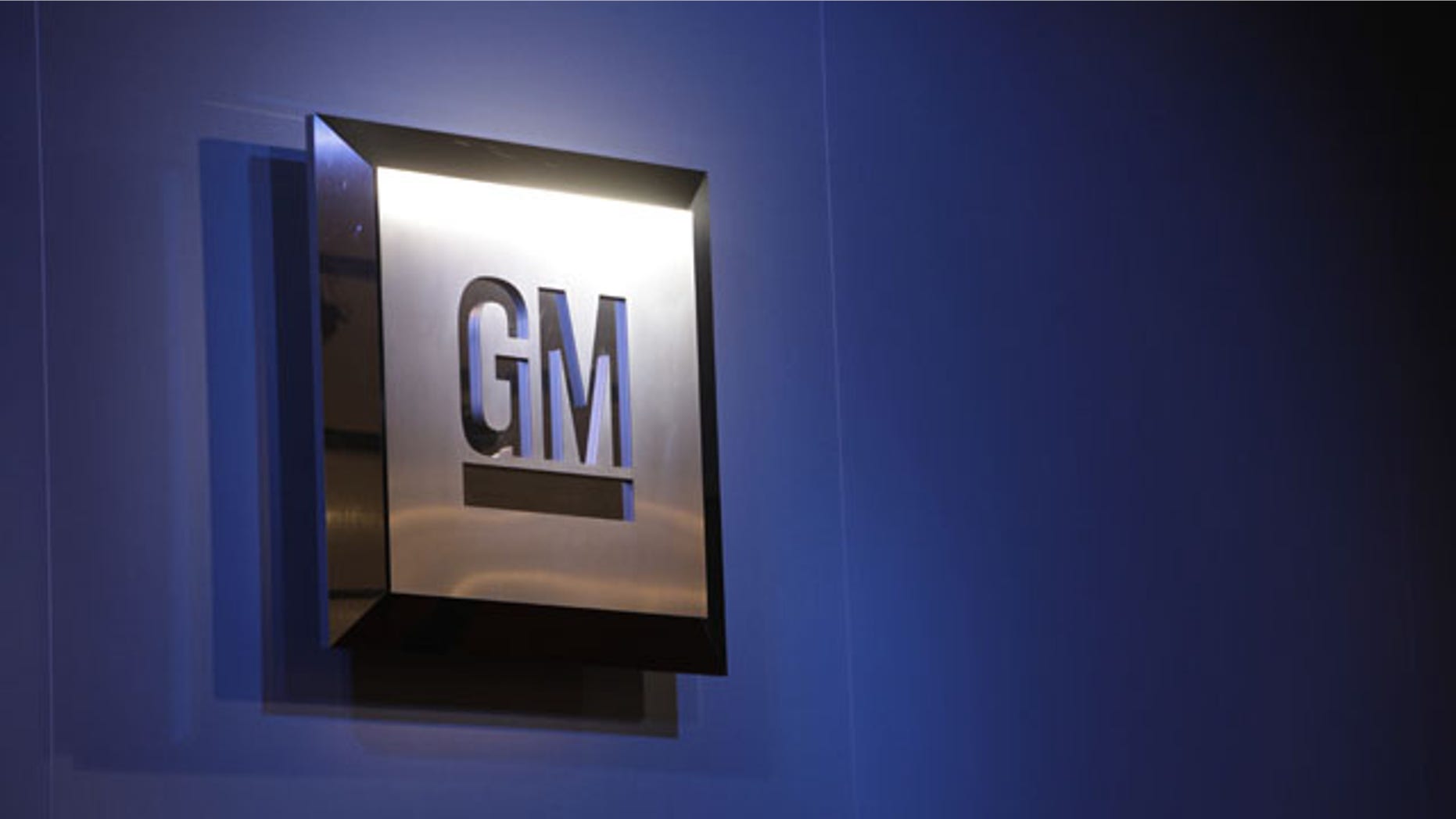 FILE - In this Jan. 12, 2009 file photo, the General Motors logo is on display at the North American International Auto Show in Detroit. (AP Photo/Paul Sancya, File)