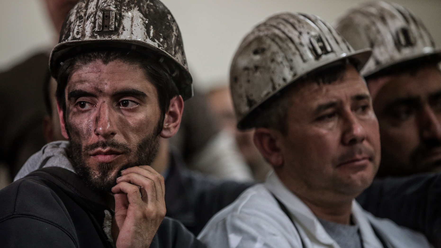 May 16, 2014 - Turkish miners listen to the mining company's owner, Alp Gurkan, during a news conference in Soma, Turkey. The Turkish mining company defended its safety record, 4 days after more than 284 people died in an underground blaze at its coal mine in western Turkey.