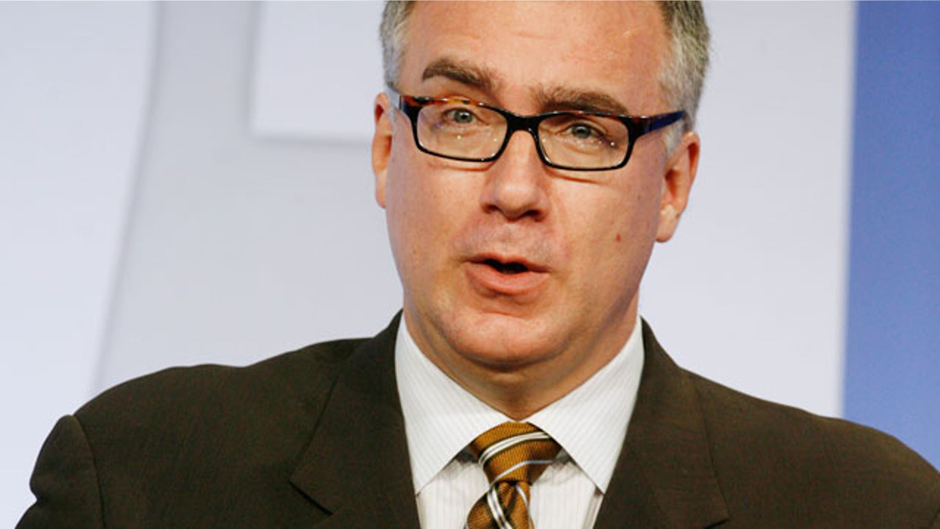 Current TV has fired Keith Olbermann and replaced him with Eliot Spitzer.