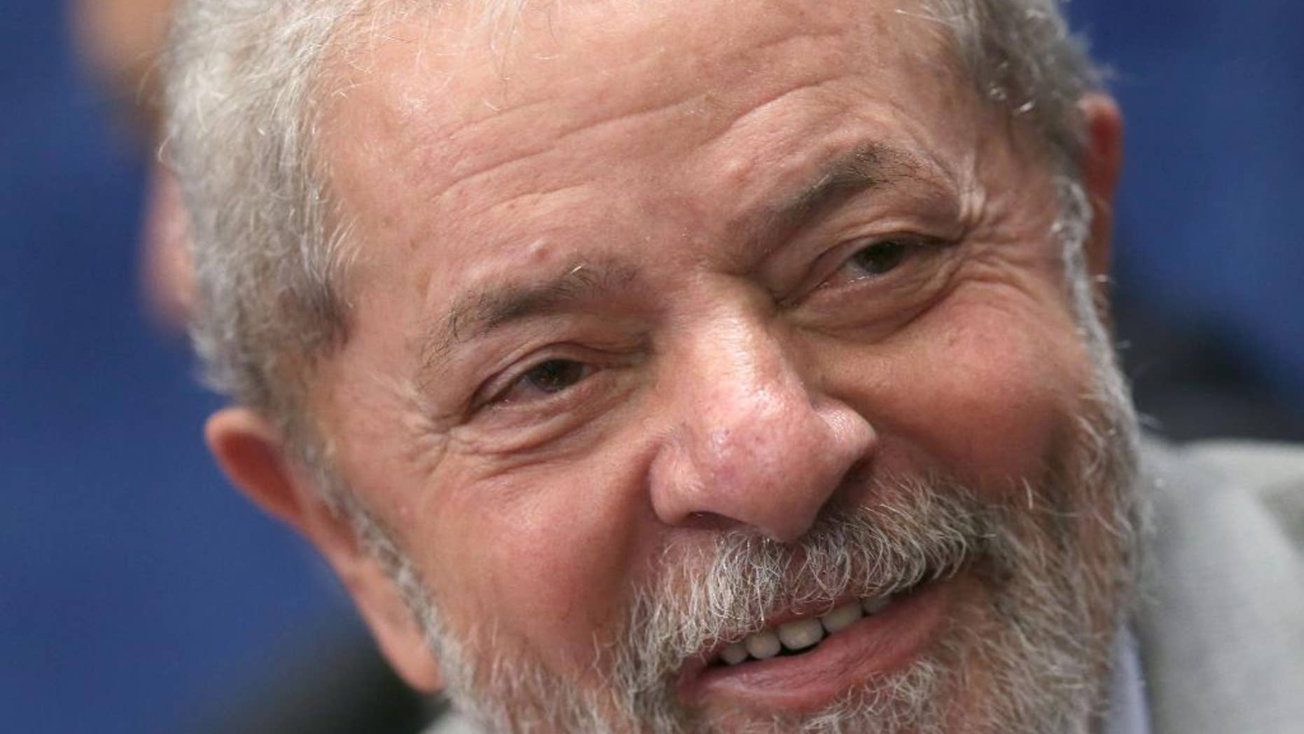 FILE - In this Aug. 29, 2016 file photo, Brazil's former President Luiz Inacio Lula da Silva attends the impeachment trial of suspended President Dilma Rousseff in Brasilia, Brazil. Federal investigators charged Lula with money laundering and corruption on Wednesday, Sept. 14, 2016 in connection with a sprawling corruption investigation at state-run oil giant Petrobras. (AP Photo/Eraldo Peres, File)