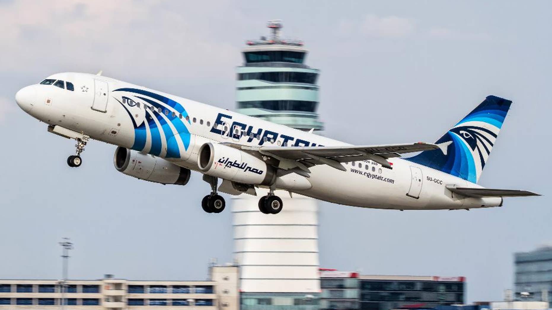 This August 21, 2015 photo shows an EgyptAir Airbus A320 with the registration SU-GCC taking off from Vienna International Airport, Austria. Egyptian aviation officials said on Thursday May 19, 2016 that an EgyptAir plane with the registration SU-GCC, traveling from Paris to Cairo with 66 passengers and crew on board has crashed off the Greek island of Karpathos. Meanwhile, Egypt's chief prosecutor Nabil Sadek says he has ordered an "urgent investigation" into crash. Sadek instructed the National Security Prosecutor to open an "extensive investigation" in the incident. (AP Photo/Thomas Ranner)