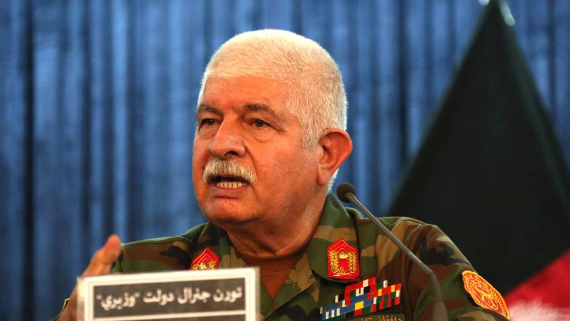 Gen. Dawlat Waziri, spokesman for the Afghan defense ministry, speaks during a press conference in Kabul, Afghanistan, Tuesday, Oct. 4, 2016. Fierce gun battles raged for a second day Tuesday across Afghanistan’s embattled northern city of Kunduz after the Taliban launched a multipronged attack on the city they briefly captured last year, while in the south they took control of a district. (AP Photo)