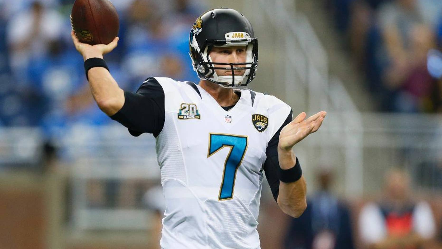 Jacksonville Jaguars quarterback Chad Henne throws against the Detroit Lions in the first half of a preseason NFL football game at Ford Field in Detroit, Friday, Aug. 22, 2014. (AP Photo/Rick Osentoski)