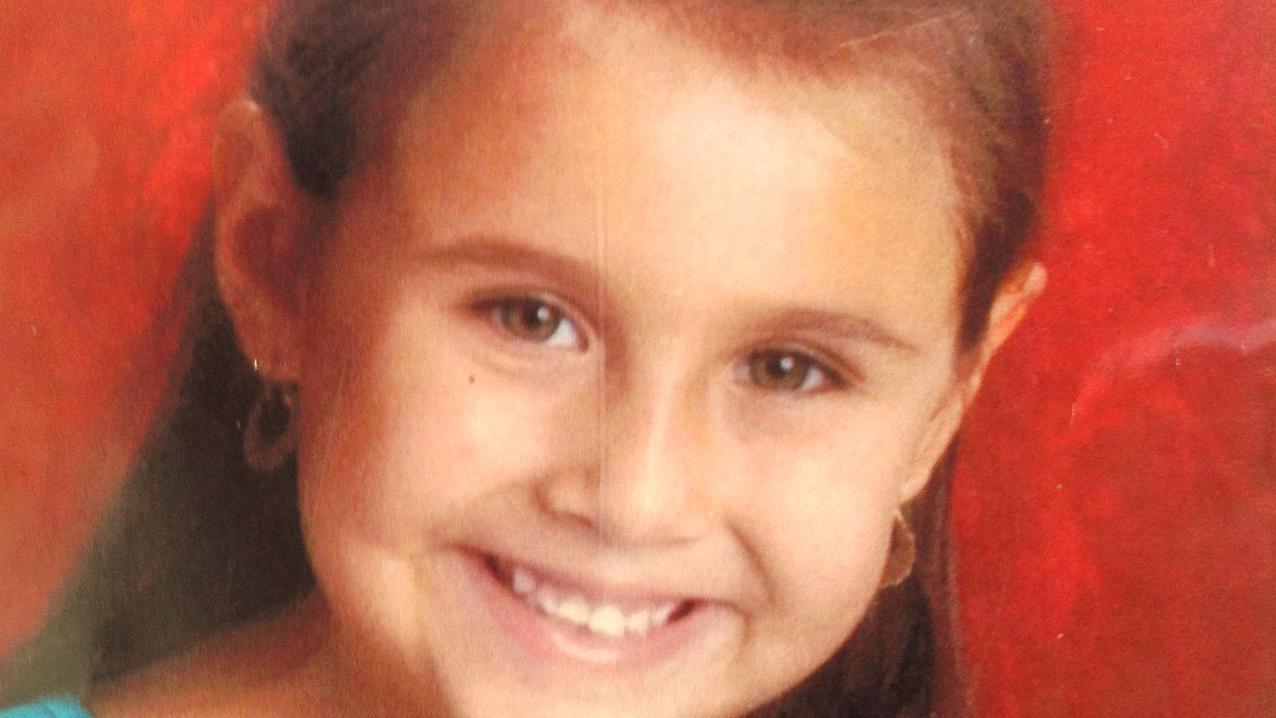 FILE - This undated file photo provided by the Tucson Police Department shows Isabel Mercedes Celis, 6, who has been missing since April 21, 2012 from he Tucson, Ariz., home. Dozens of police officers knocked on doors in a Tucson neighborhood Wednesday Jan. 15, 2014, in hopes of finding new information in an investigation of Celis, who was abducted more than 18 months ago. (AP Photo/Tucson Police Department, file)