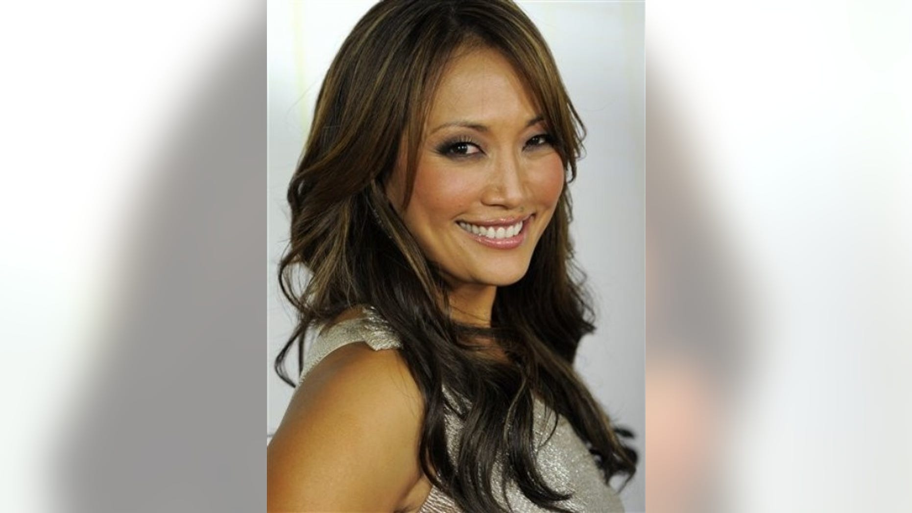 FILE - In this Sept. 20, 2010 file photo, Carrie Ann Inaba poses at the 11th season premiere of "Dancing with the Stars." (AP Photo/Chris Pizzello, file)