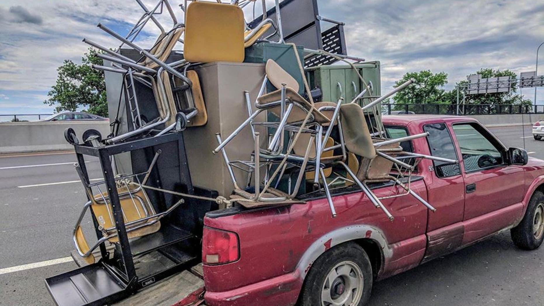 Massachusetts State Police cited a driver in Springfield for an unsecured load on Wednesday.