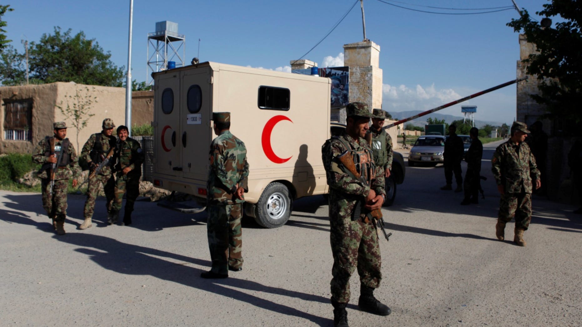 Four guards were killed in Afghanistan on Monday, days after a seperate attack left more than 100 people dead.