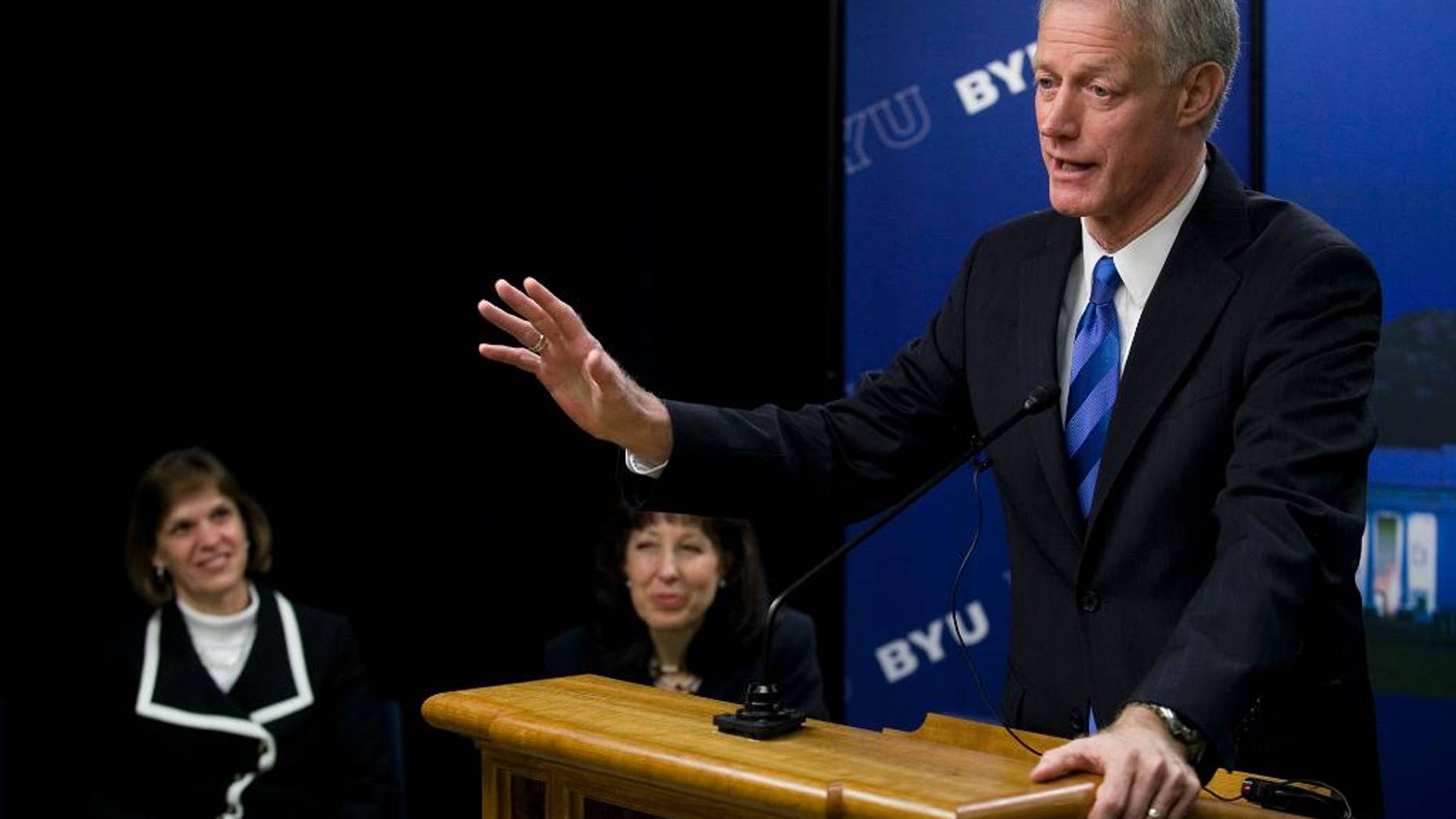 FILE - This March 11, 2014, file photo, Kevin Worthen, the newly-appointed president of Brigham Young University, speaks during a news conference, in Provo, Utah. Worthen says a faculty advisory council created to review how the school handles reports of sexual assault will present its findings this fall. The Daily Herald of Provo reports that Worthen made the comments Monday during a talk to BYU faculty. (Mark Johnston/The Daily Herald via AP)