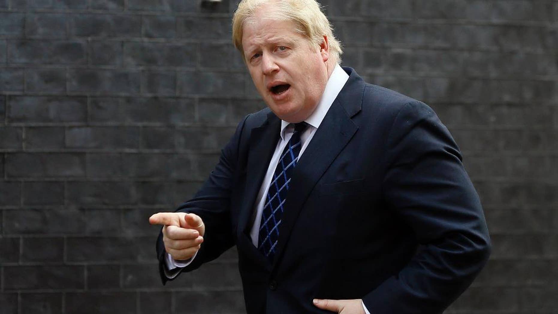 FILE - In this Tuesday, March 22, 2016 file photo, Boris Johnson arrives for a meeting at Downing Street in London. Ex-London Mayor Boris Johnson has compared the European Union’s aims to those of Adolf Hitler, arguing that the 28-nation bloc is creating a superstate that mirrors the attempt of the Nazi leader to dominate the European continent. Johnson’s remarks in The Sunday Telegraph on Sunday, May 15 elicited outrage on the part of those campaigning to remain in the EU ahead of a June 23 vote on whether to stay or go. (AP Photo/Kirsty Wigglesworth, file)