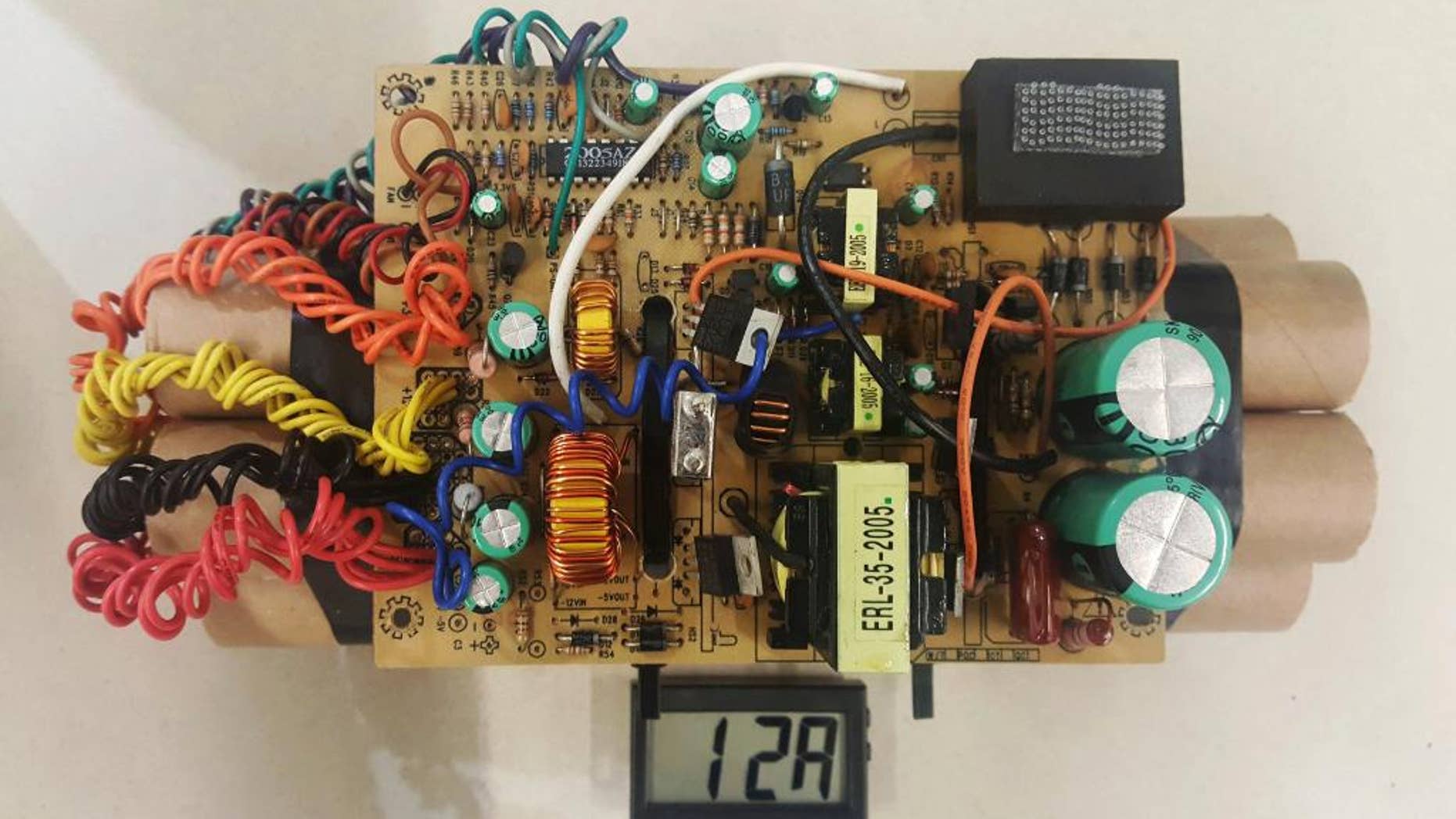 This April 2017 photo provided by U.S. Customs and Border Protection shows a mock improvised explosive device that led to delays at Toronto's Pearson International Airport when it was found in a passenger's luggage. American Joseph Galaska was charged with mischief. (U.S. Customs and Border Protection Patrol via AP)