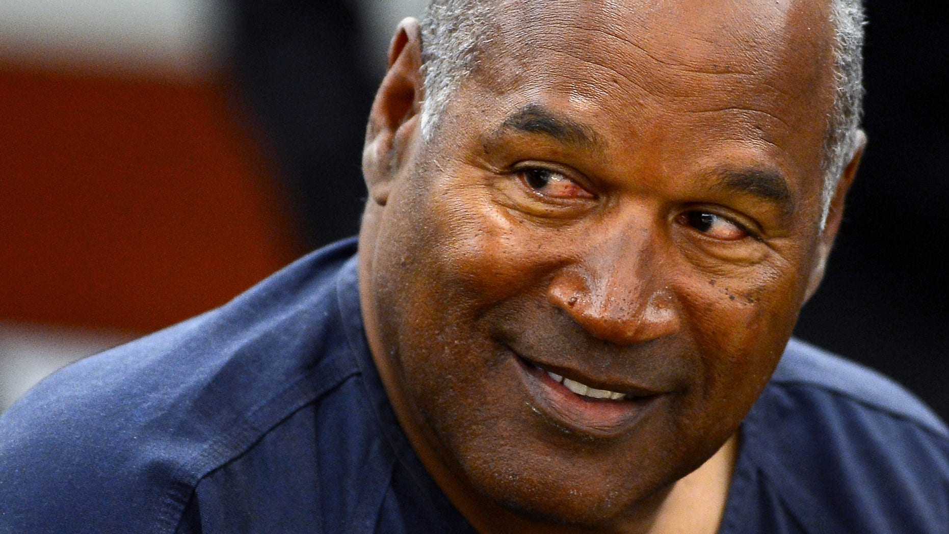 O. J. Simpson appears for the second day of an evidentiary hearing in Clark County District Court, Tuesday, May 14, 2013 in Las Vegas. The hearing is aimed at proving Simpson's trial lawyer, Yale Galanter, had conflicted interests and shouldn't have handled Simpson's case. Simpson is serving nine to 33 years in prison for his 2008 conviction in the armed robbery of two sports memorabilia dealers in a Las Vegas hotel room. (AP Photo/Ethan Miller, Pool)