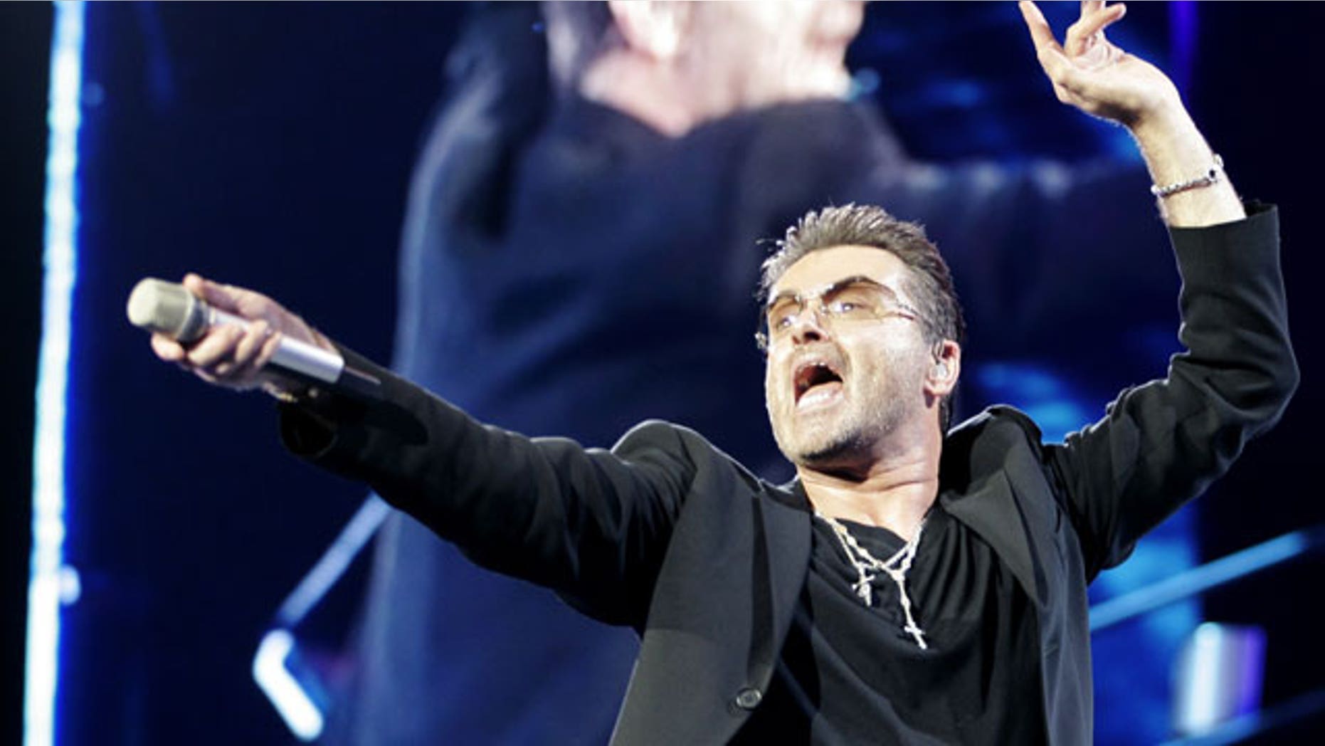 George Michael performs during his concert as part of his 25 Live European tour at the OAKA Stadium in Athens, July 26, 2007. (REUTERS)