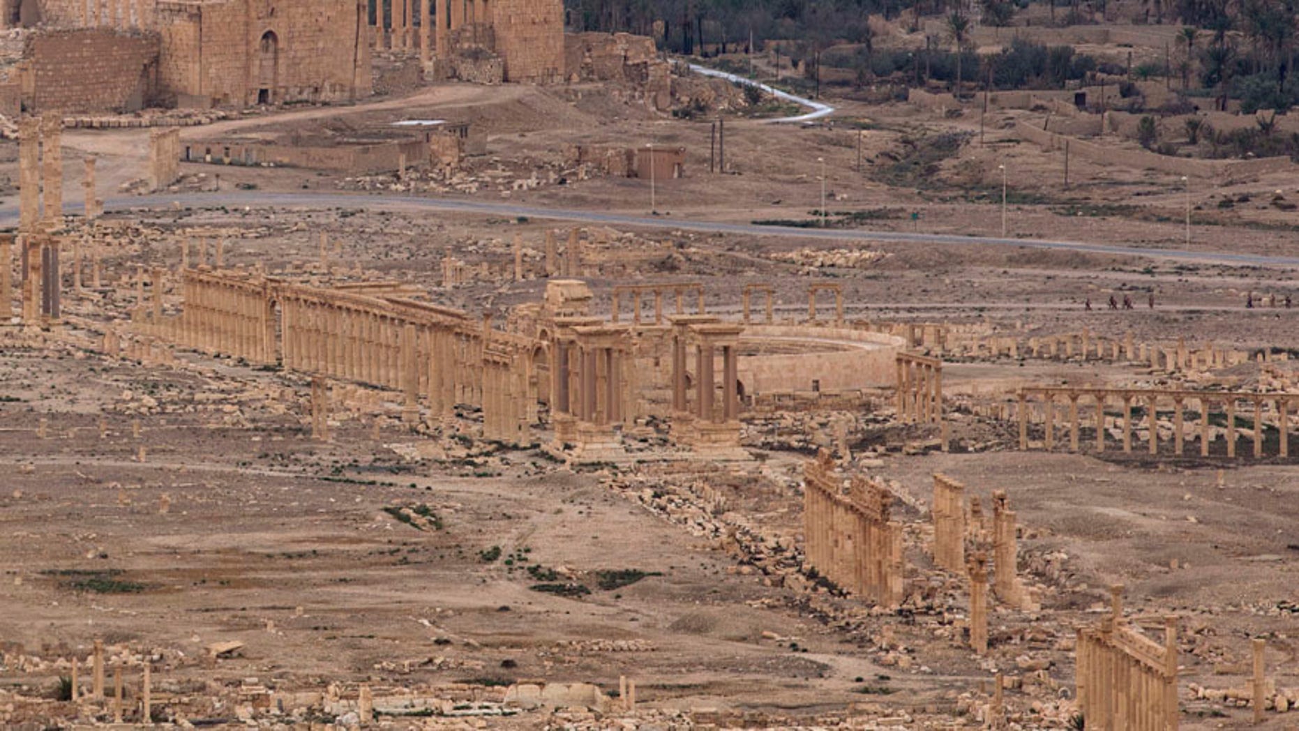 This Thursday, April 14, 2016, file photo shows the ancient city of Palmyra in the central city of Homs, Syria, Thursday, April 14, 2016. Russia says its air force has helped Syrian troops repulse an Islamic State attack on Palmyra, but opposition activists say the extremists have seized areas on the outskirts of the town, including a historic castle that overlooks ancient ruins. (AP Photo/Hassan Ammar, File)