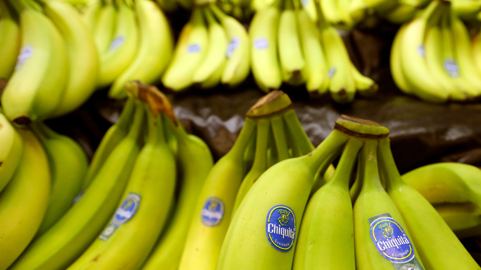 FILE - This Sept. 10, 2014 file photo shows bunches of Chiquita brand bananas for sale at a grocery store in Zelienople, Pa. Chiquita Brands International Inc. on Monday, Oct. 27, 2014 said it has agreed to sell itself to two Brazilian companies for approximately $681 million, just days after the fresh produce company's shareholders rejected plans to merge with Irish fruit importer Fyffes. (AP Photo/Keith Srakocic, File)