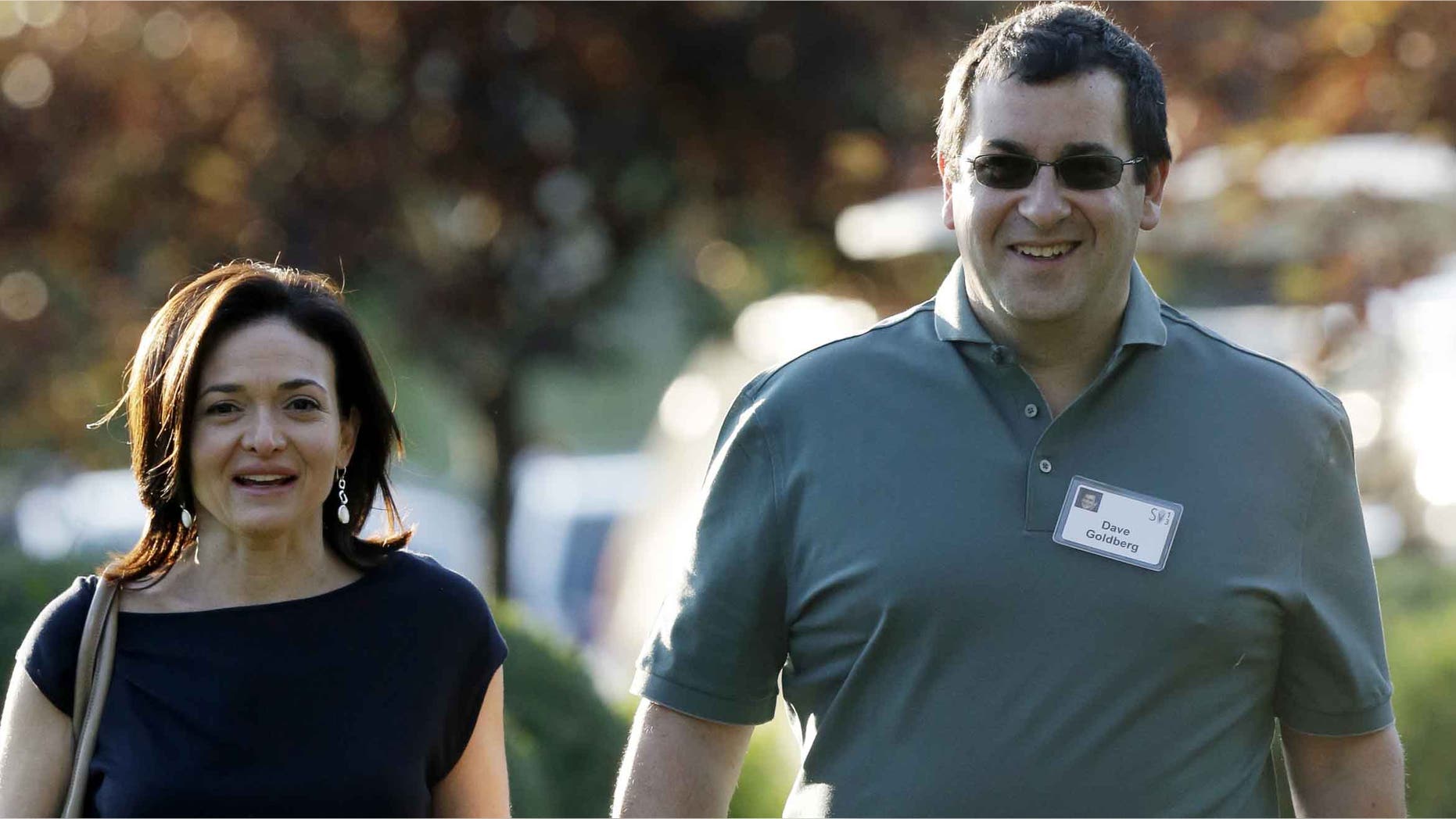 Sheryl Sandberg, COO of Facebook, and her husband David Goldberg in a 2013 file photo.