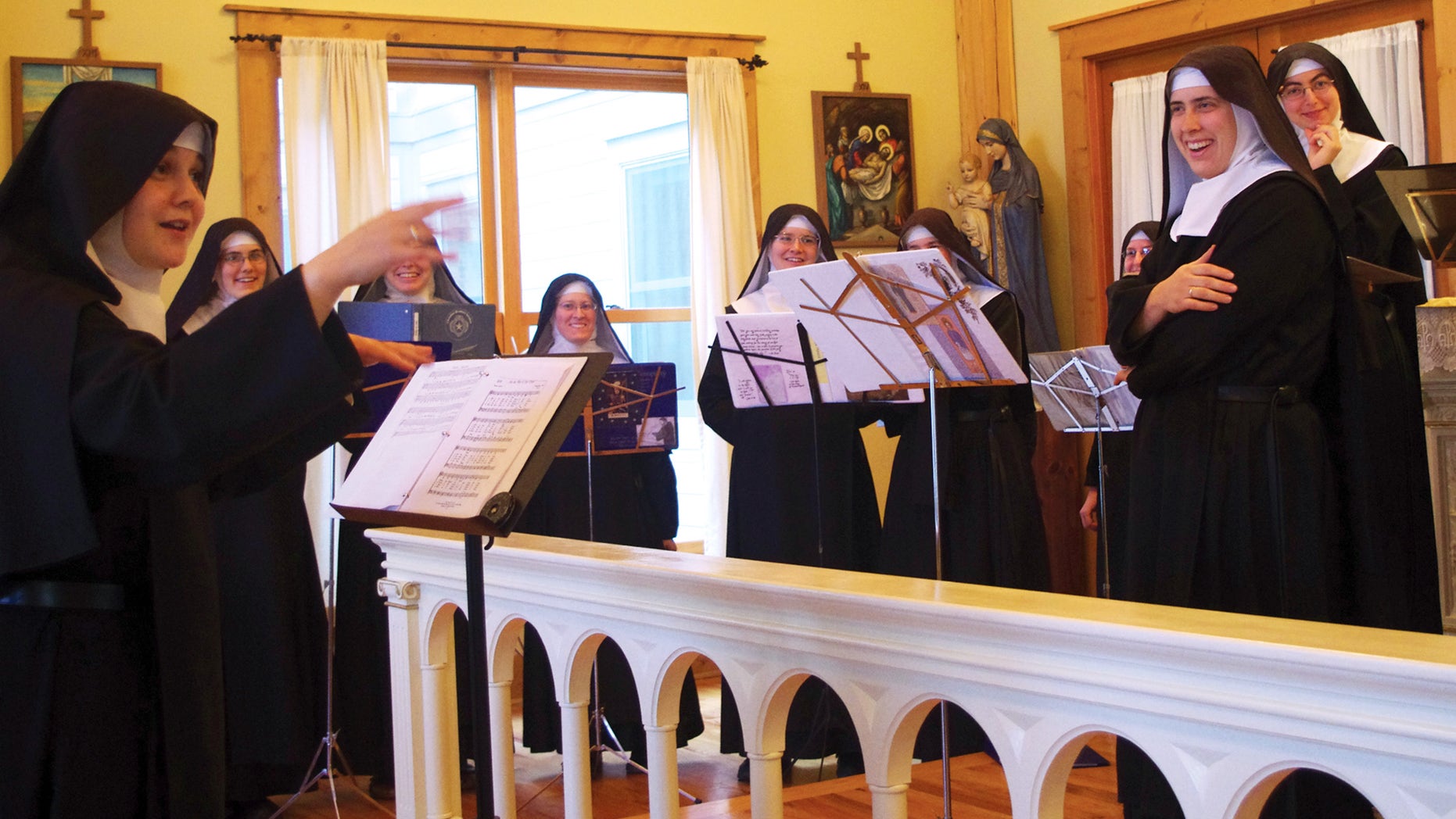 Nov. 18, 2013. Mother Cecilia, left, conducts the Sisters during the recording sessions for "Lent at Ephesus" in the chapel at the Priory of The Benedictines of Mary called "Ephesus" near Gower, Mo. The Benedictines of Mary were named Billboard's Top Traditional Classical Album Artist of 2013, for the second year in a row.