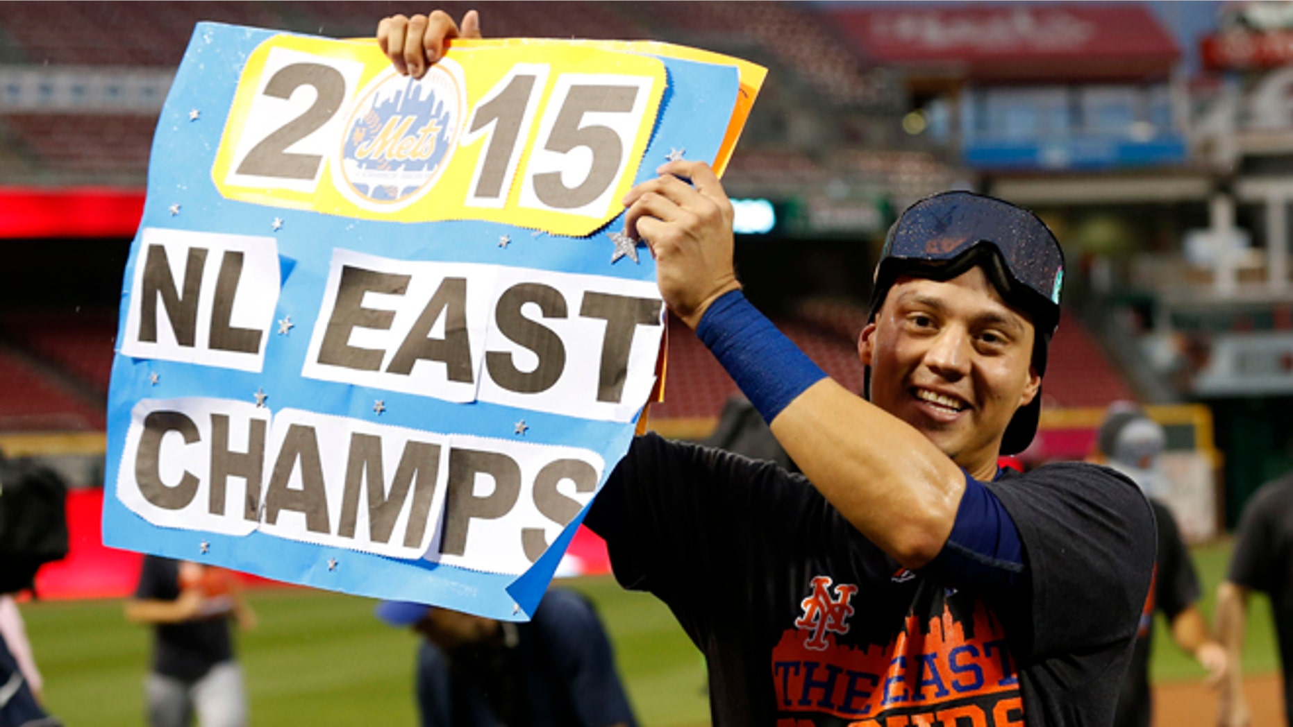 Wilmer Flores after clinching the NL East title Saturday, Sept. 26, 2015, in Cincinnati.